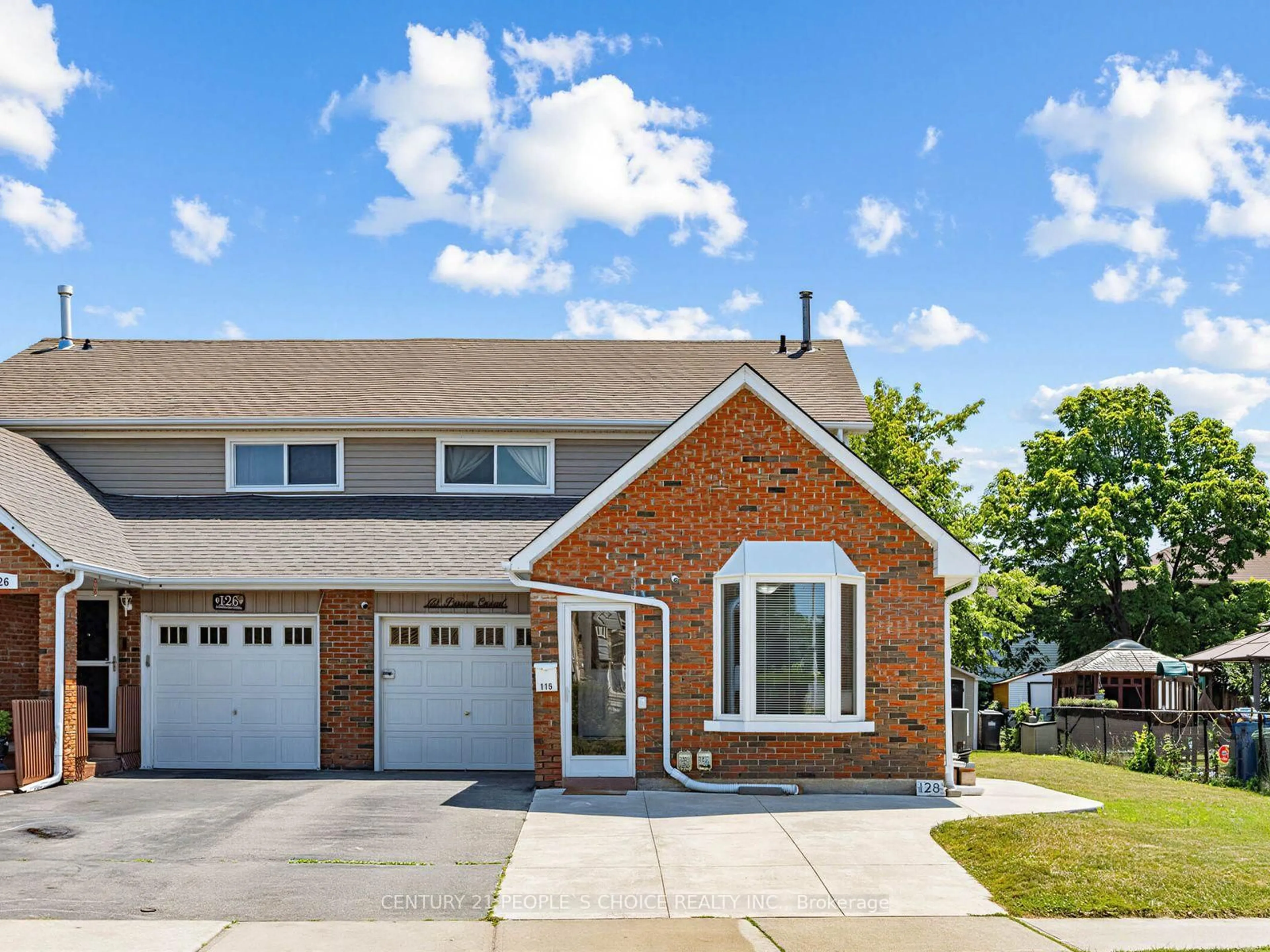 Home with brick exterior material, street for 128 Primrose Cres, Brampton Ontario L6Z 1E3