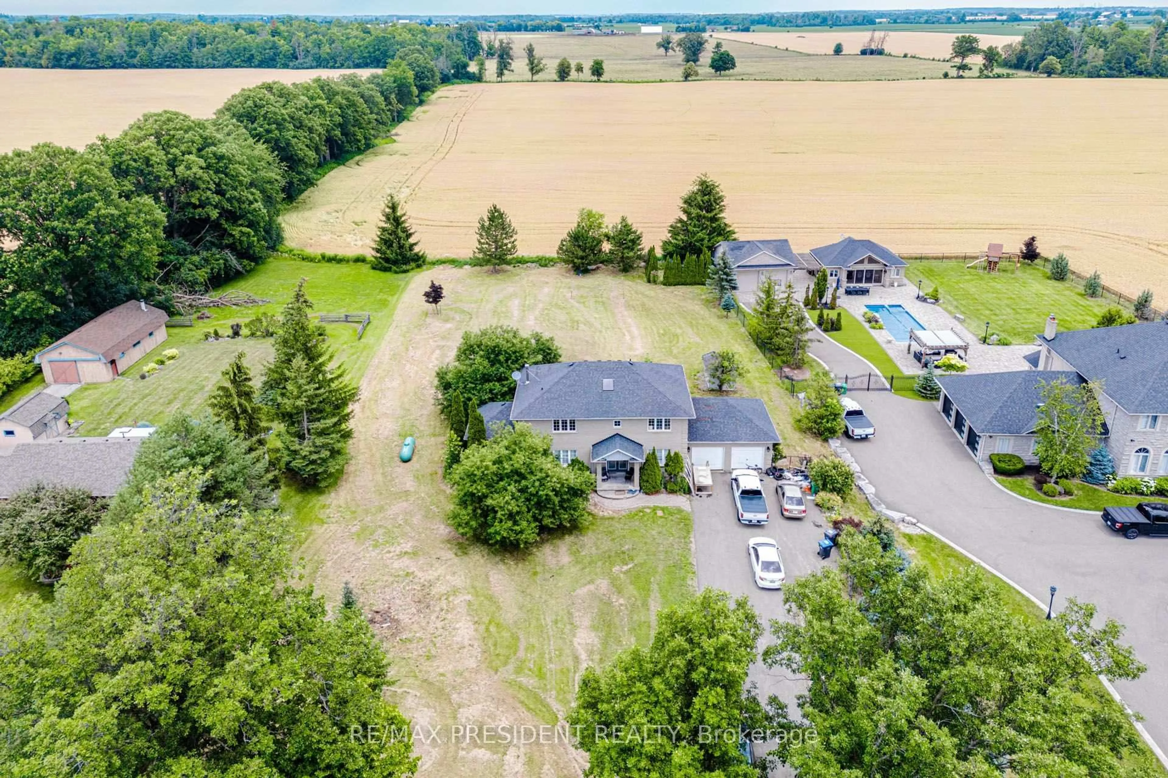 A pic from outside/outdoor area/front of a property/back of a property/a pic from drone, water/lake/river/ocean view for 12775 Heritage Rd, Caledon Ontario L7C 1T9
