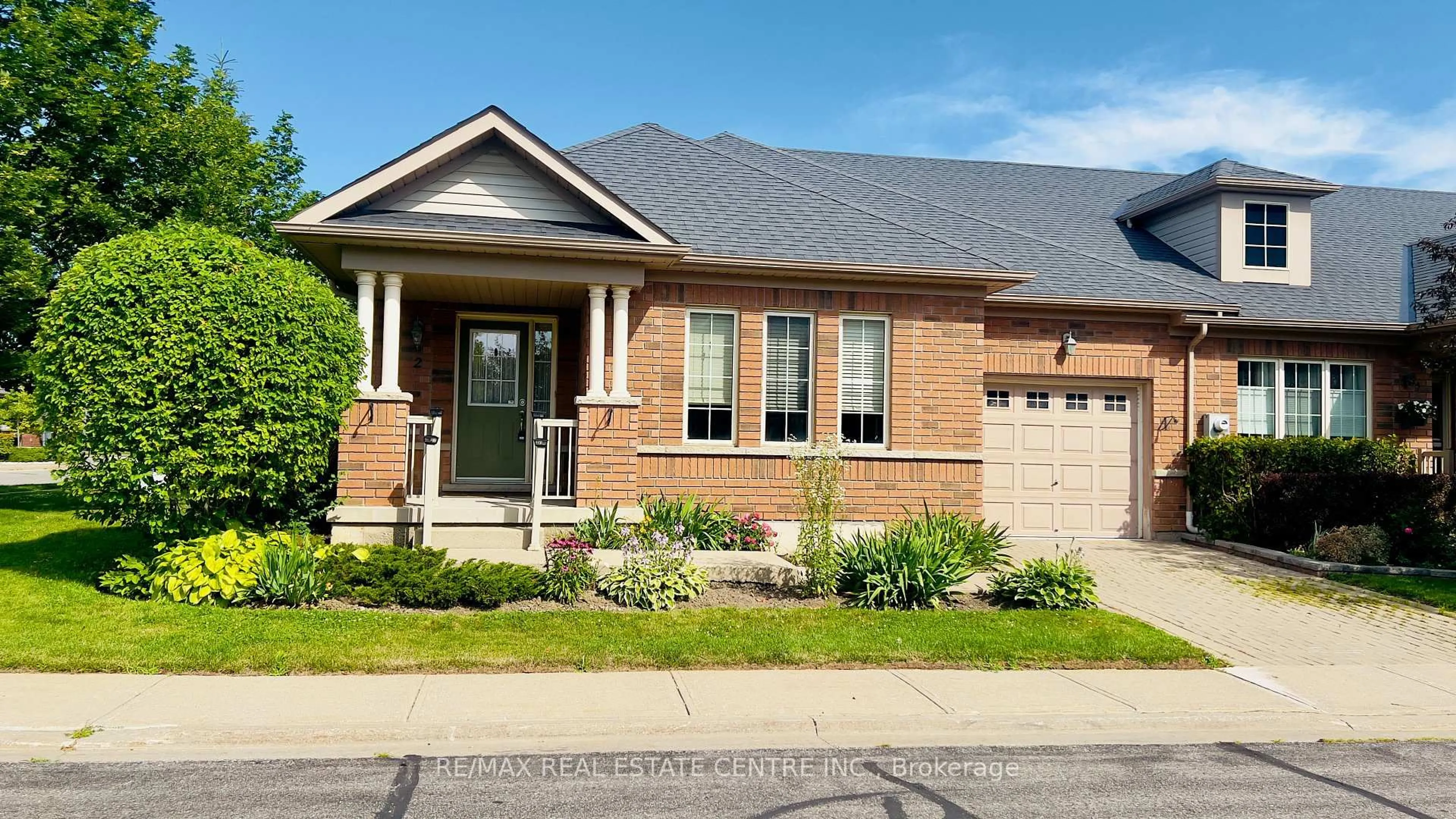Home with brick exterior material, street for 2 Alisma Tr, Brampton Ontario L6R 0Y8