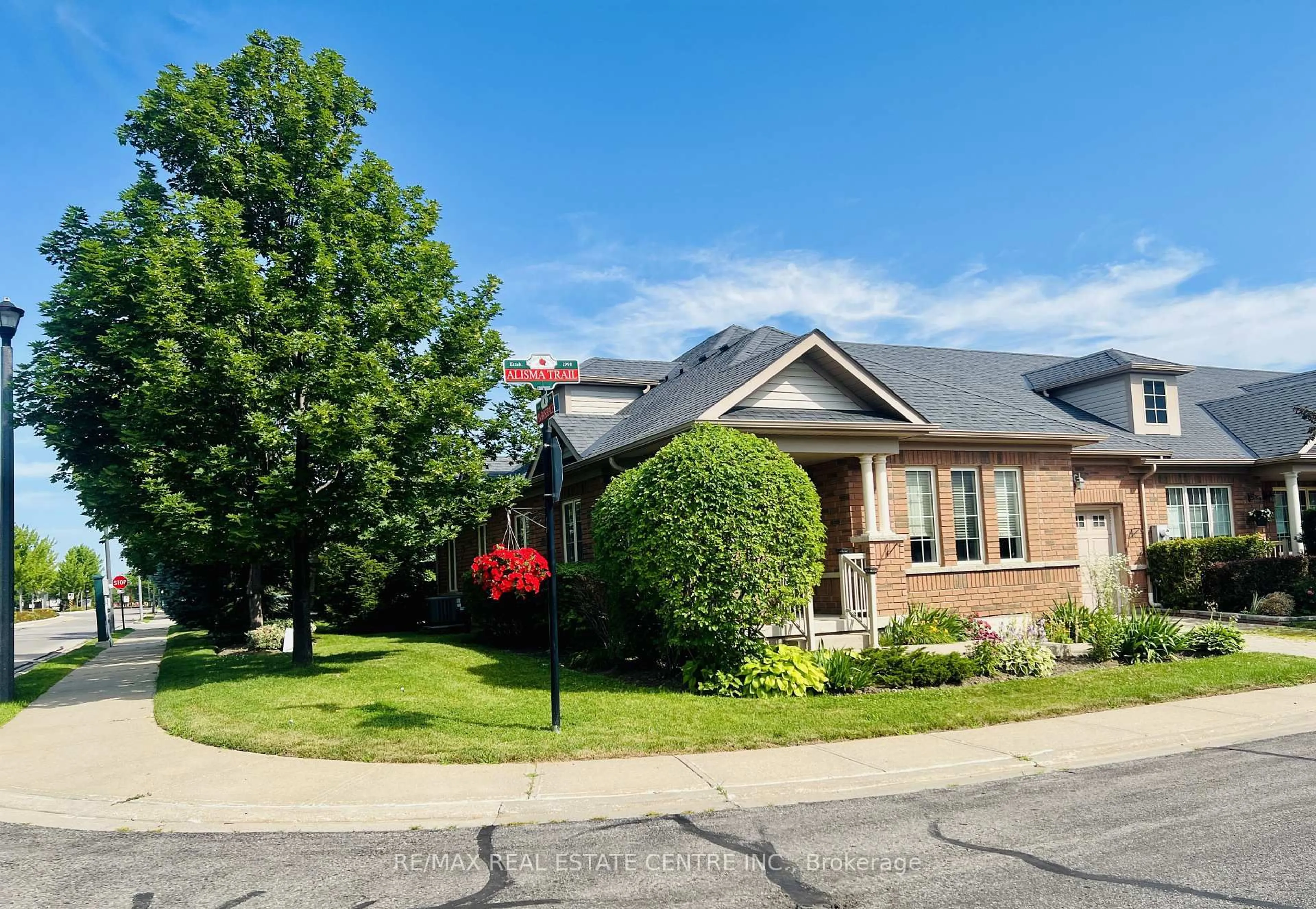Home with brick exterior material, street for 2 Alisma Tr, Brampton Ontario L6R 0Y8