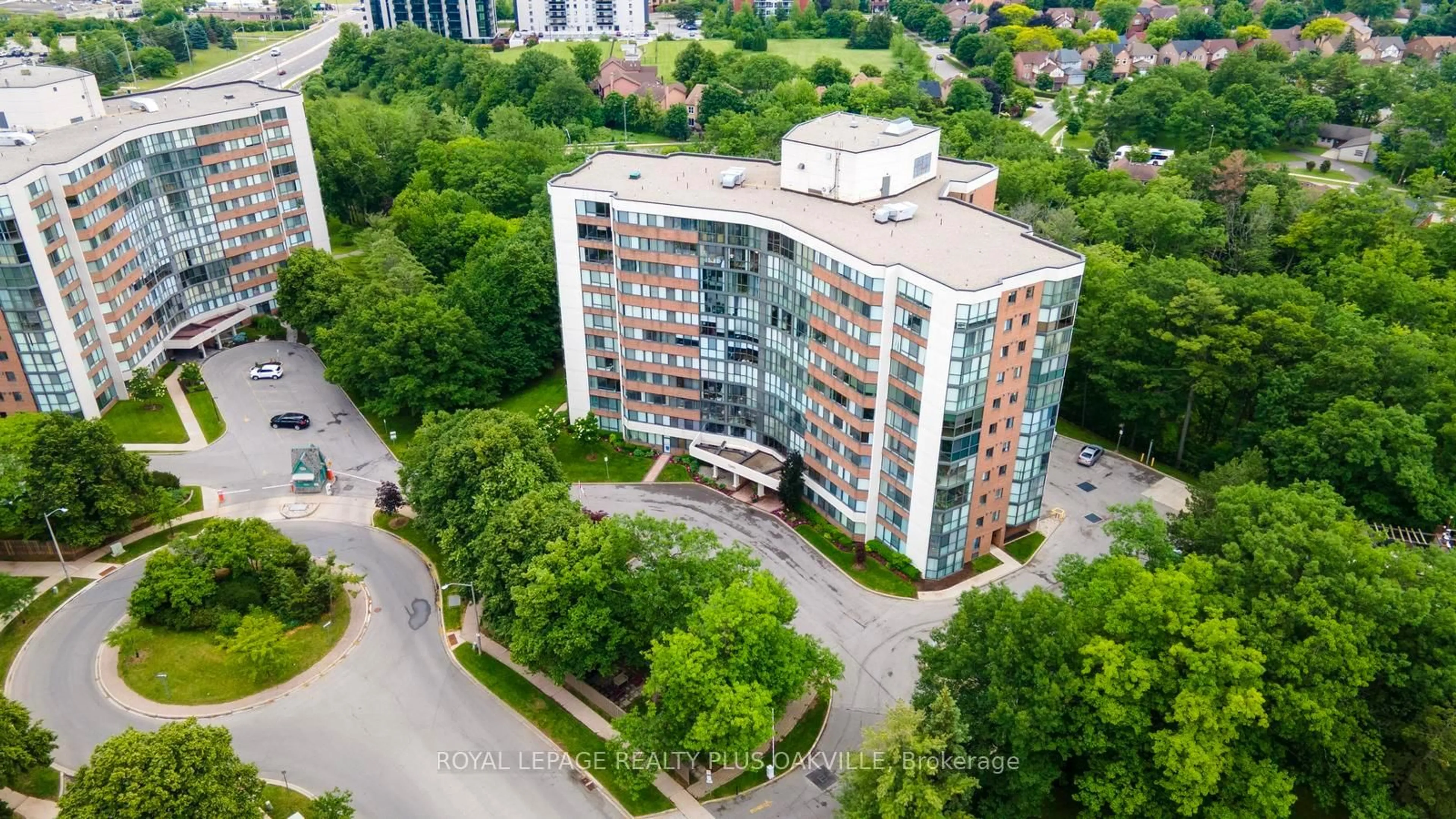 A pic from outside/outdoor area/front of a property/back of a property/a pic from drone, city buildings view from balcony for 1240 Marlborough Crt #1006, Oakville Ontario L6H 3K7