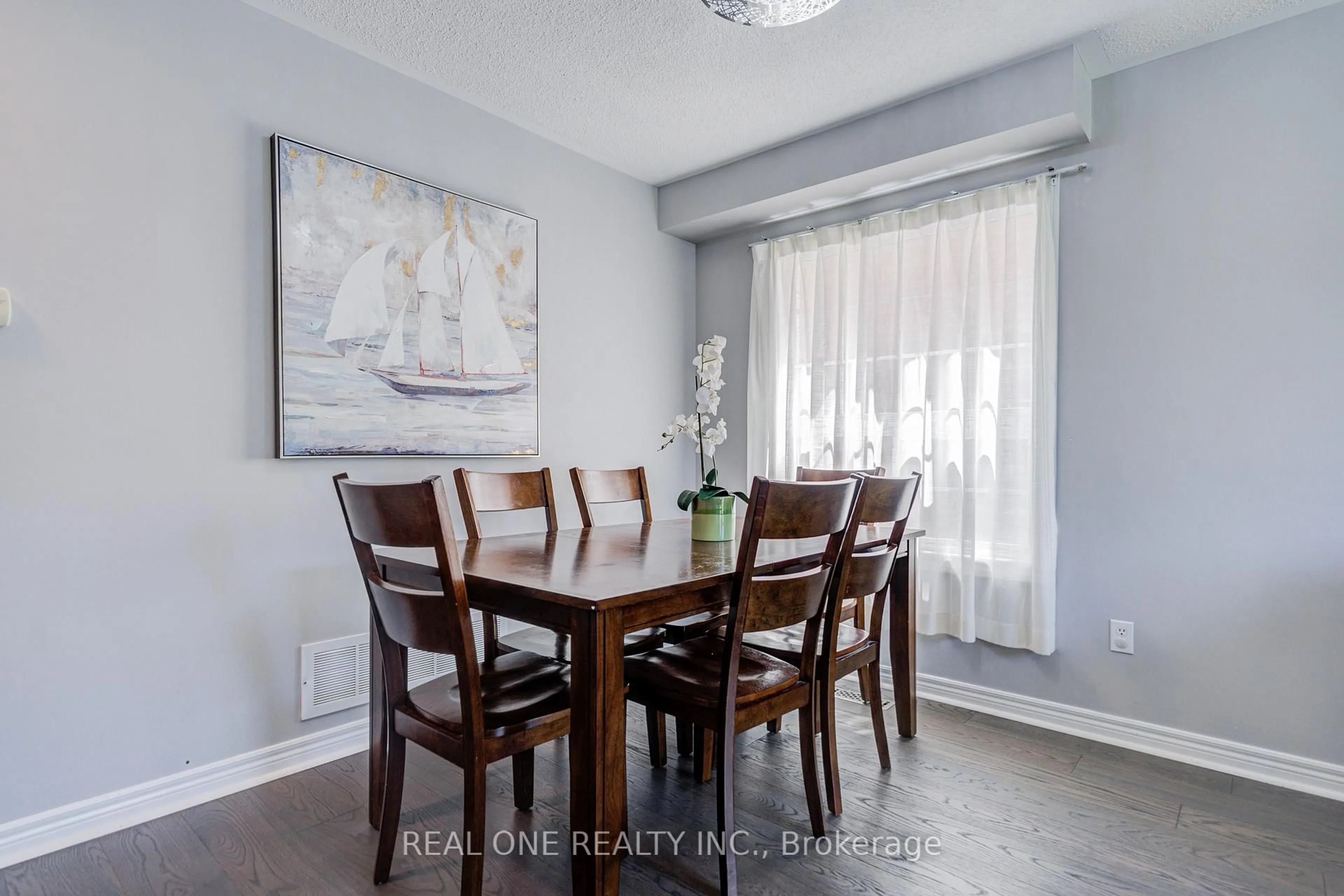 Dining room, wood/laminate floor for 5827 Rainspring Dr, Mississauga Ontario L5M 6X6