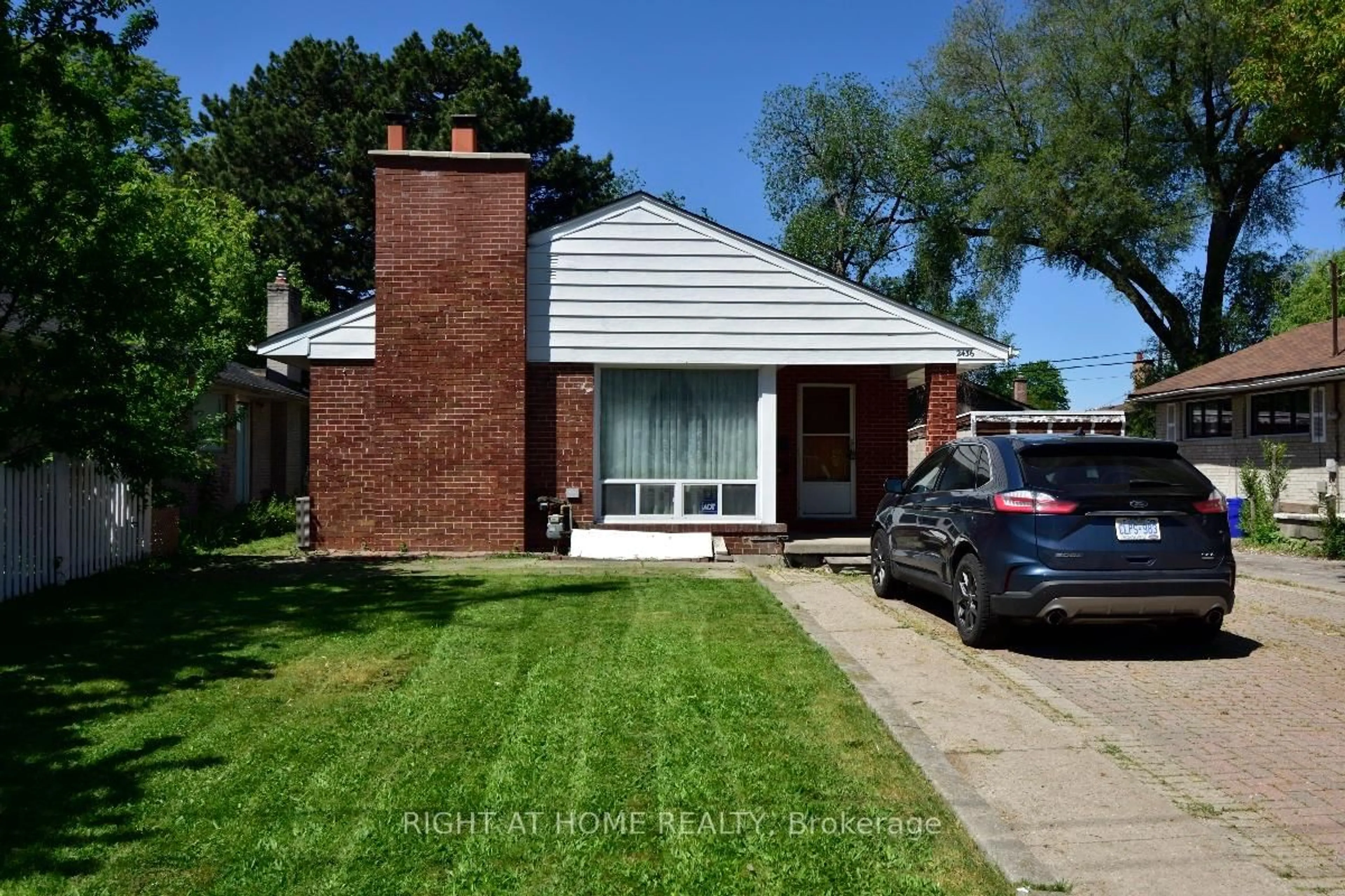 Home with brick exterior material, street for 2436 Islington Ave, Toronto Ontario M9W 3X7