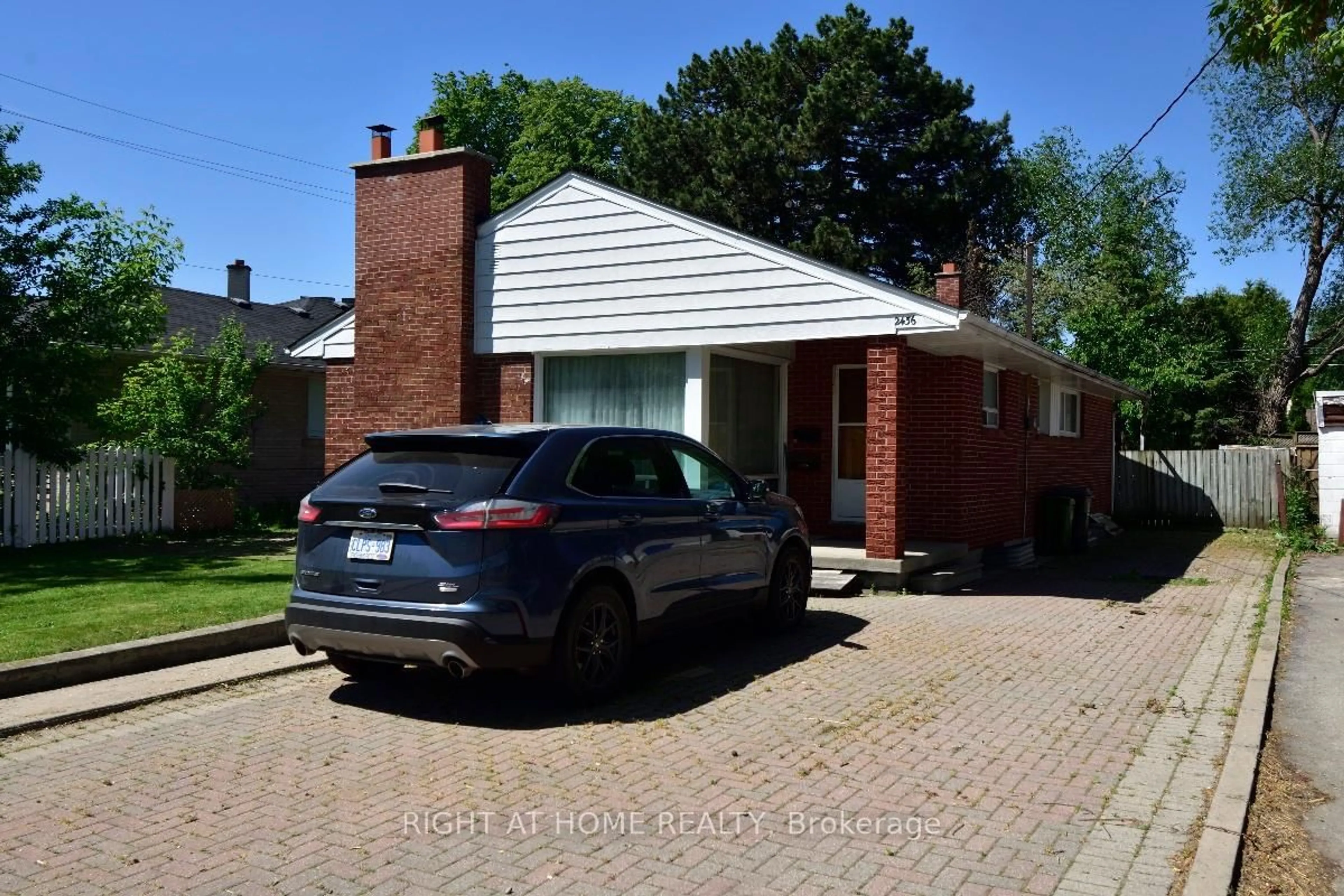 Home with brick exterior material, street for 2436 Islington Ave, Toronto Ontario M9W 3X7