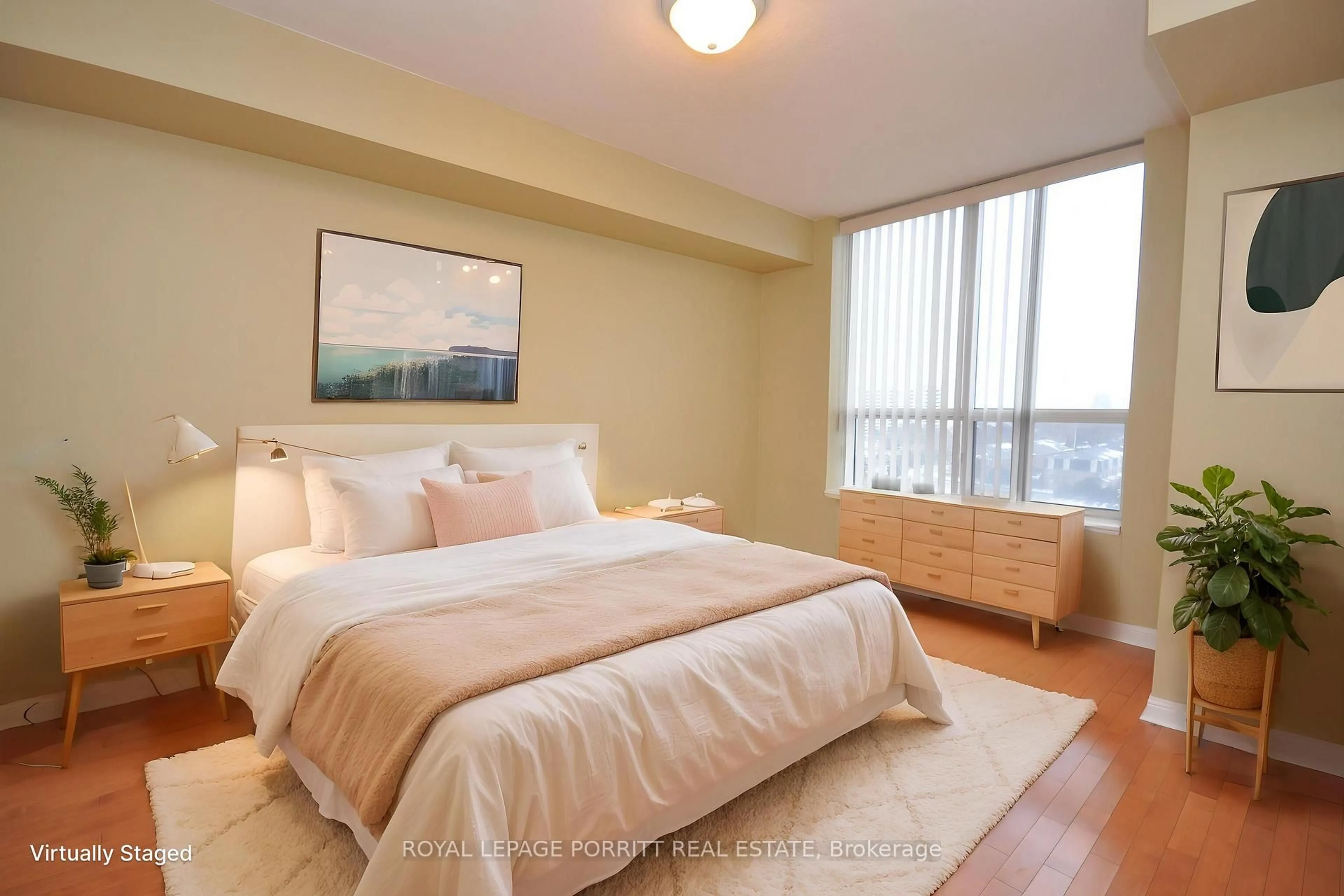 Bedroom with bed, wood/laminate floor for 1140 Parkwest Pl #901, Mississauga Ontario L5E 3K9