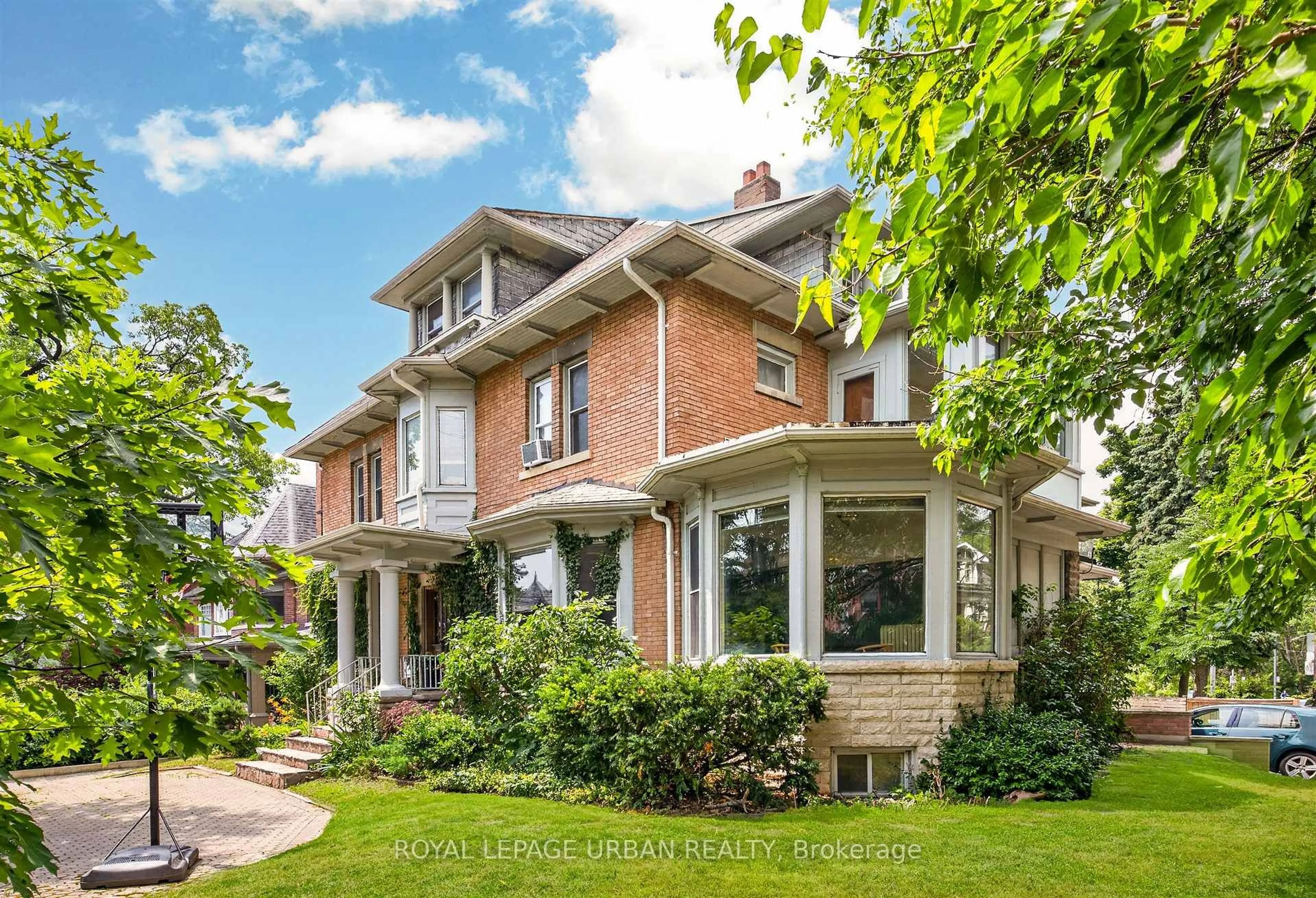 Home with brick exterior material, street for 244 Indian Rd, Toronto Ontario M6R 2W9