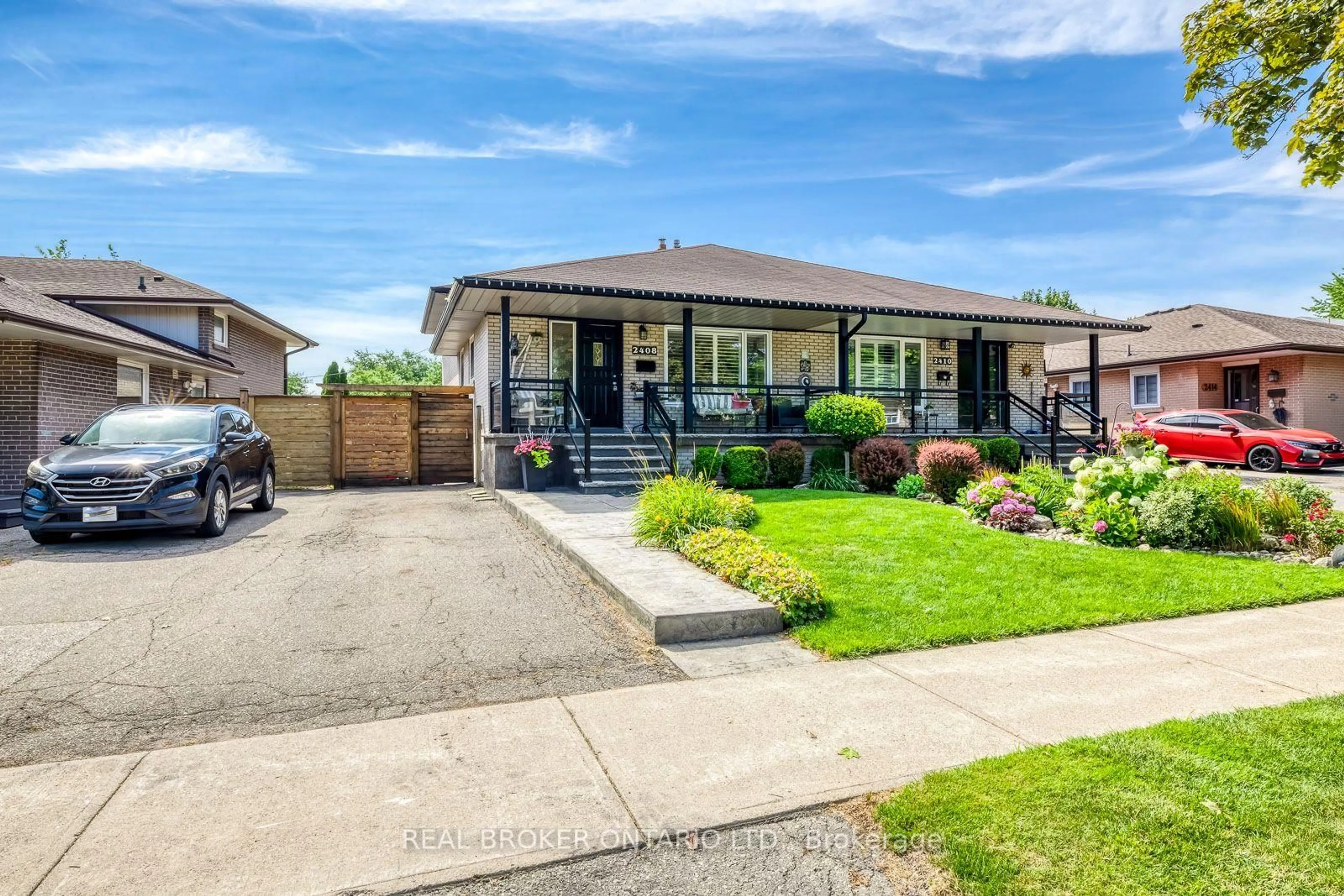 Home with brick exterior material, street for 2408 Padstow Cres, Mississauga Ontario L5J 2G4