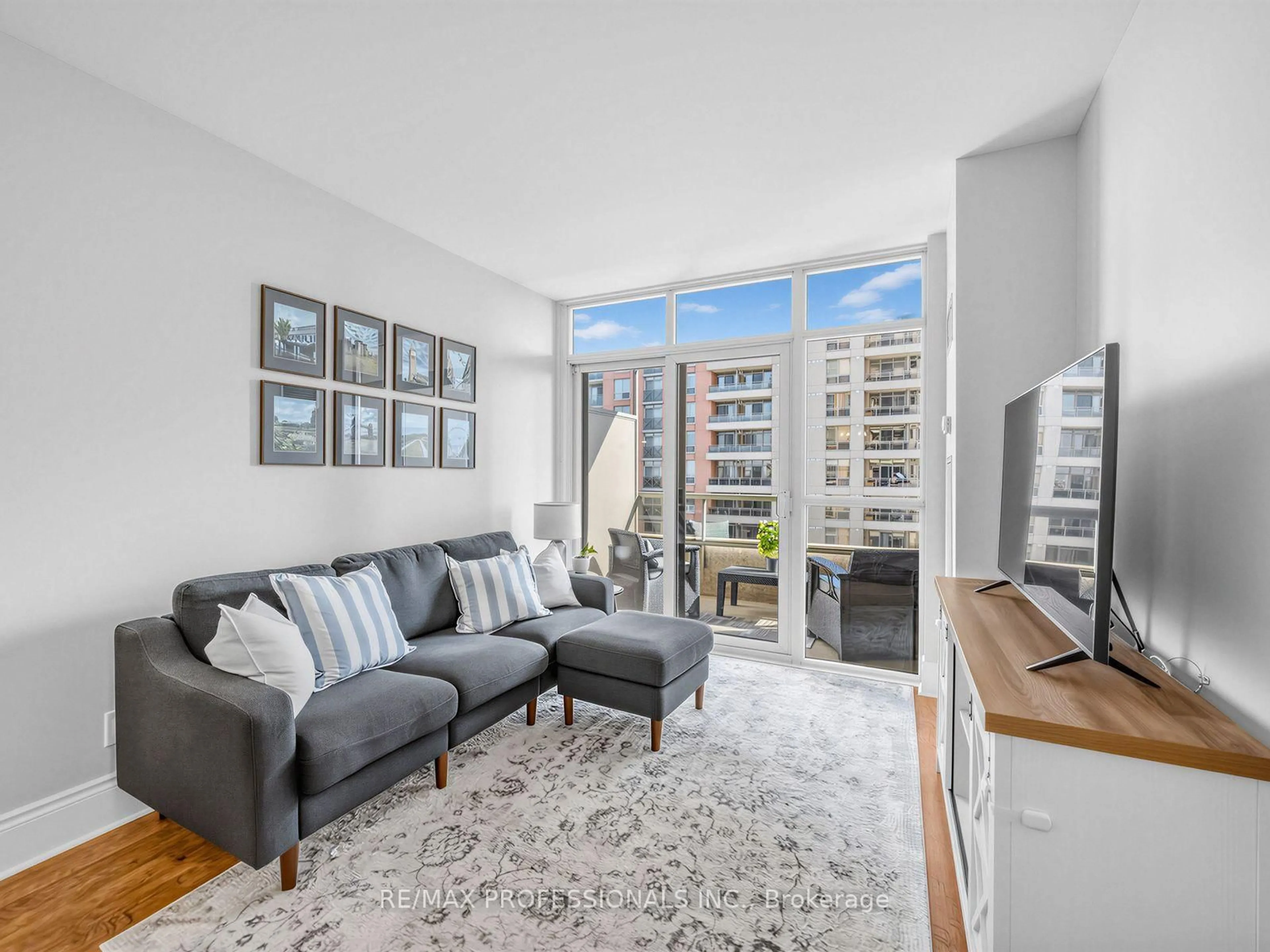 Living room with furniture, unknown for 5233 Dundas St #1123, Toronto Ontario M9B 6M1