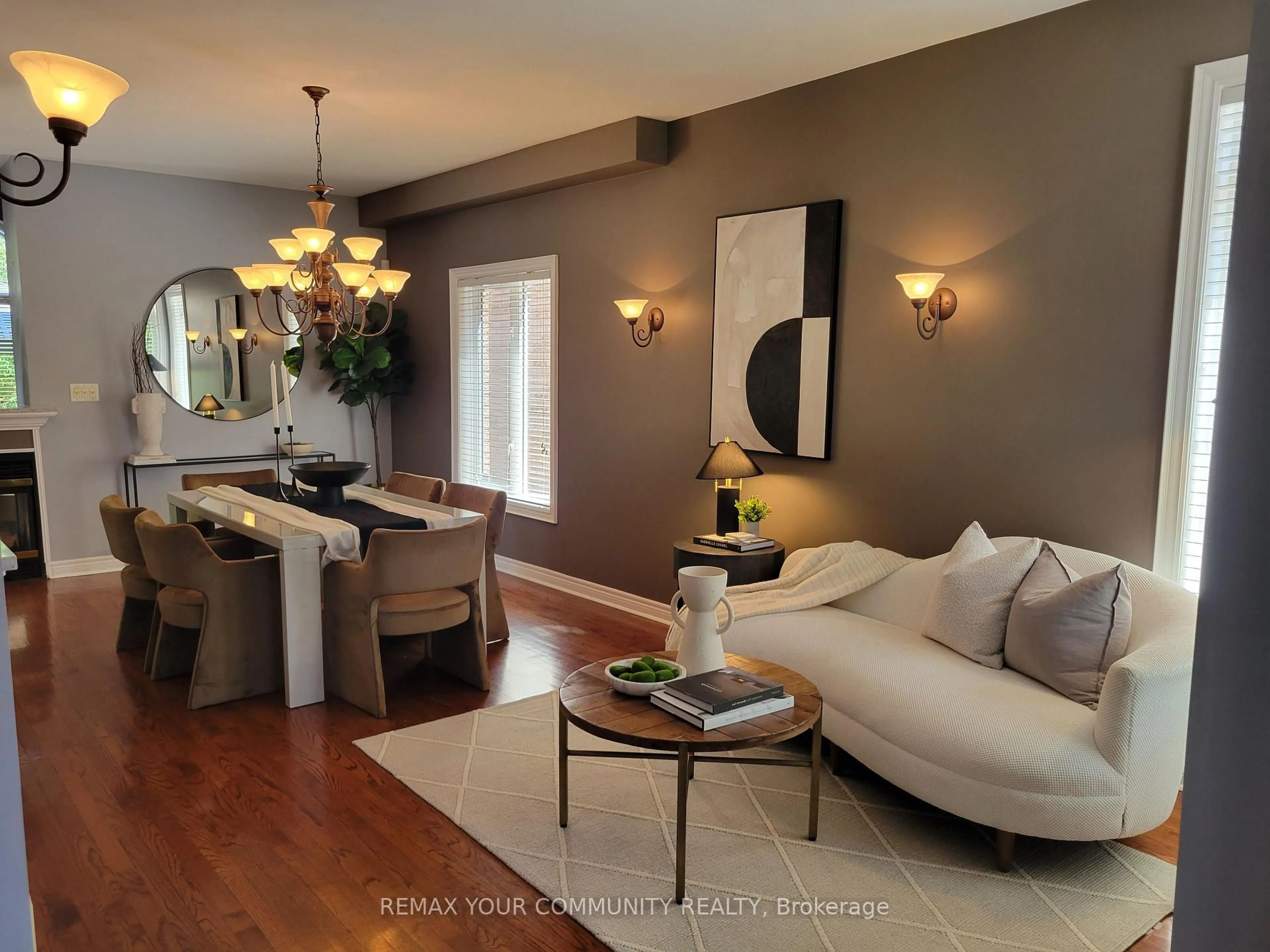 Living room with furniture, wood/laminate floor for 88 Castelli Crt, Caledon Ontario L7E 2T8