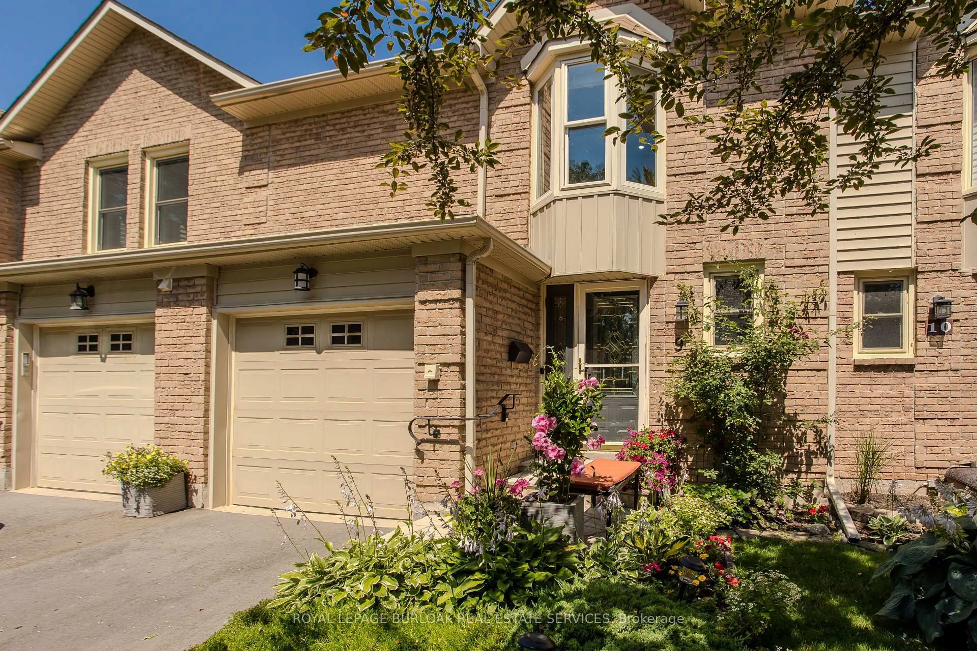 Home with brick exterior material, street for 5411 Lakeshore Rd #9, Burlington Ontario L7L 1E1