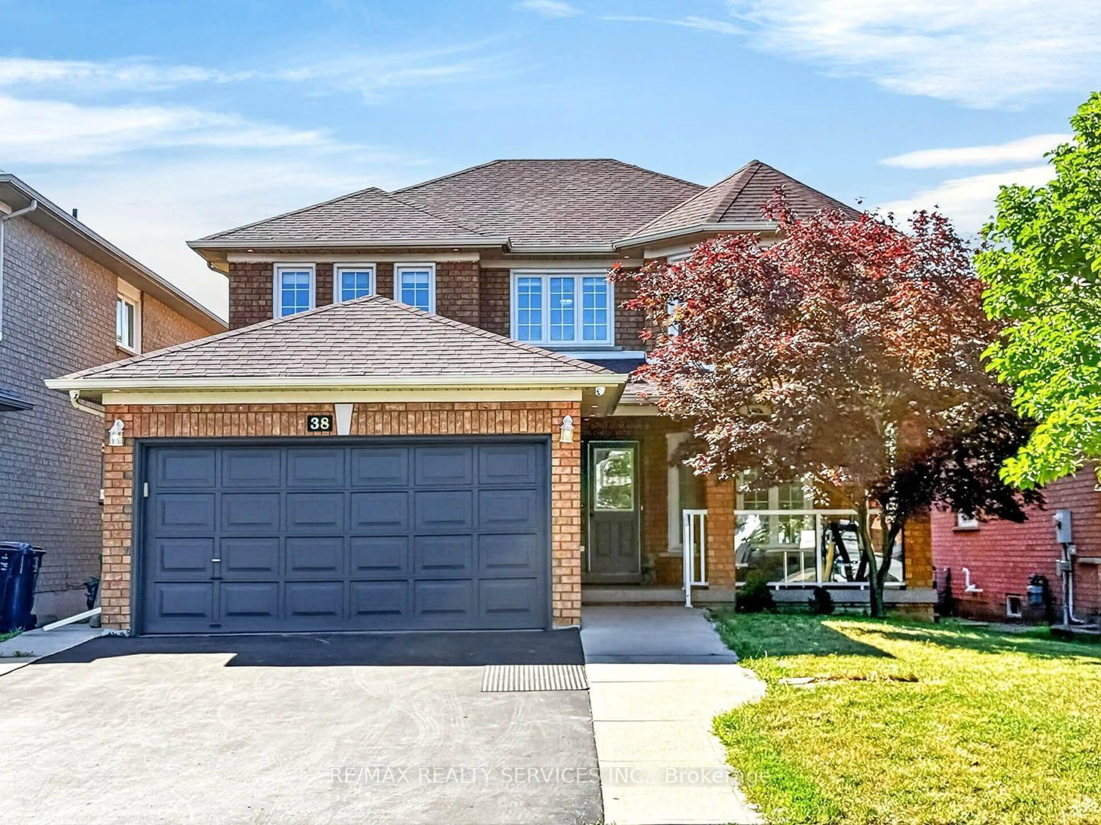 Home with brick exterior material, street for 38 Deerglen Dr, Brampton Ontario L6R 1M3
