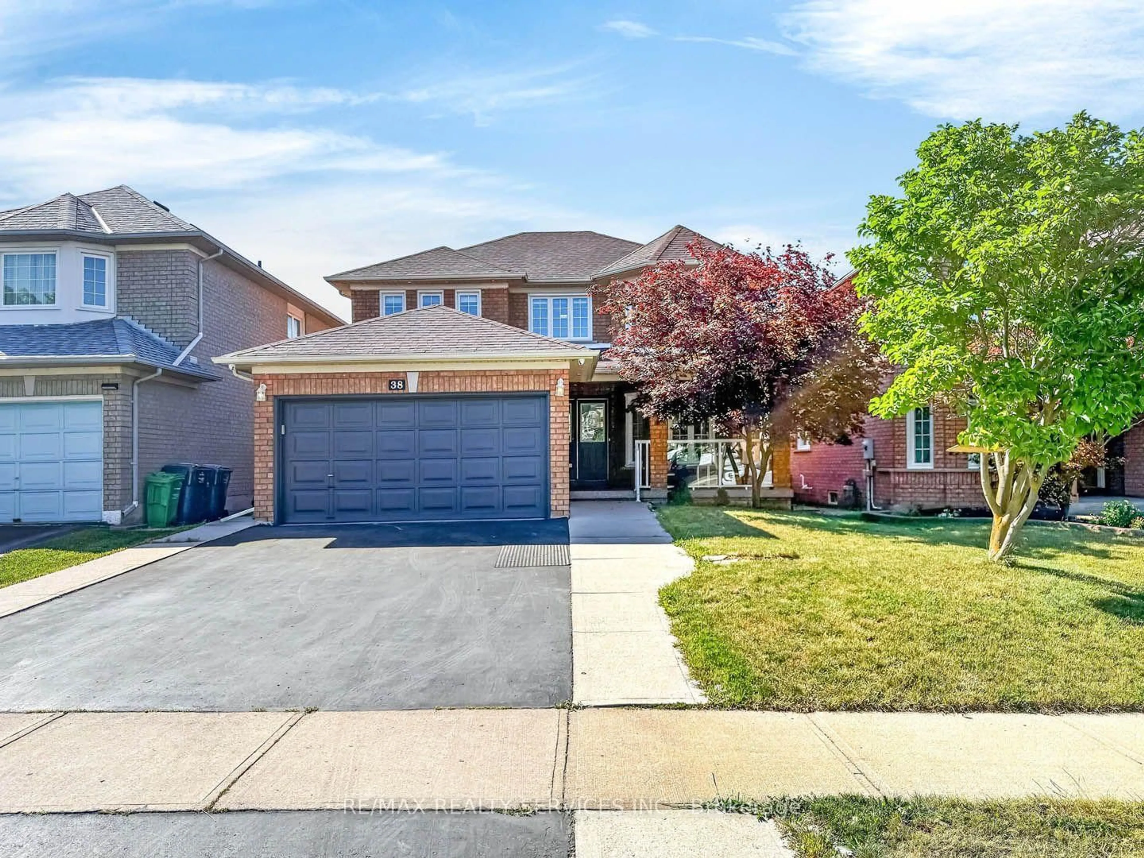 Home with brick exterior material, street for 38 Deerglen Dr, Brampton Ontario L6R 1M3