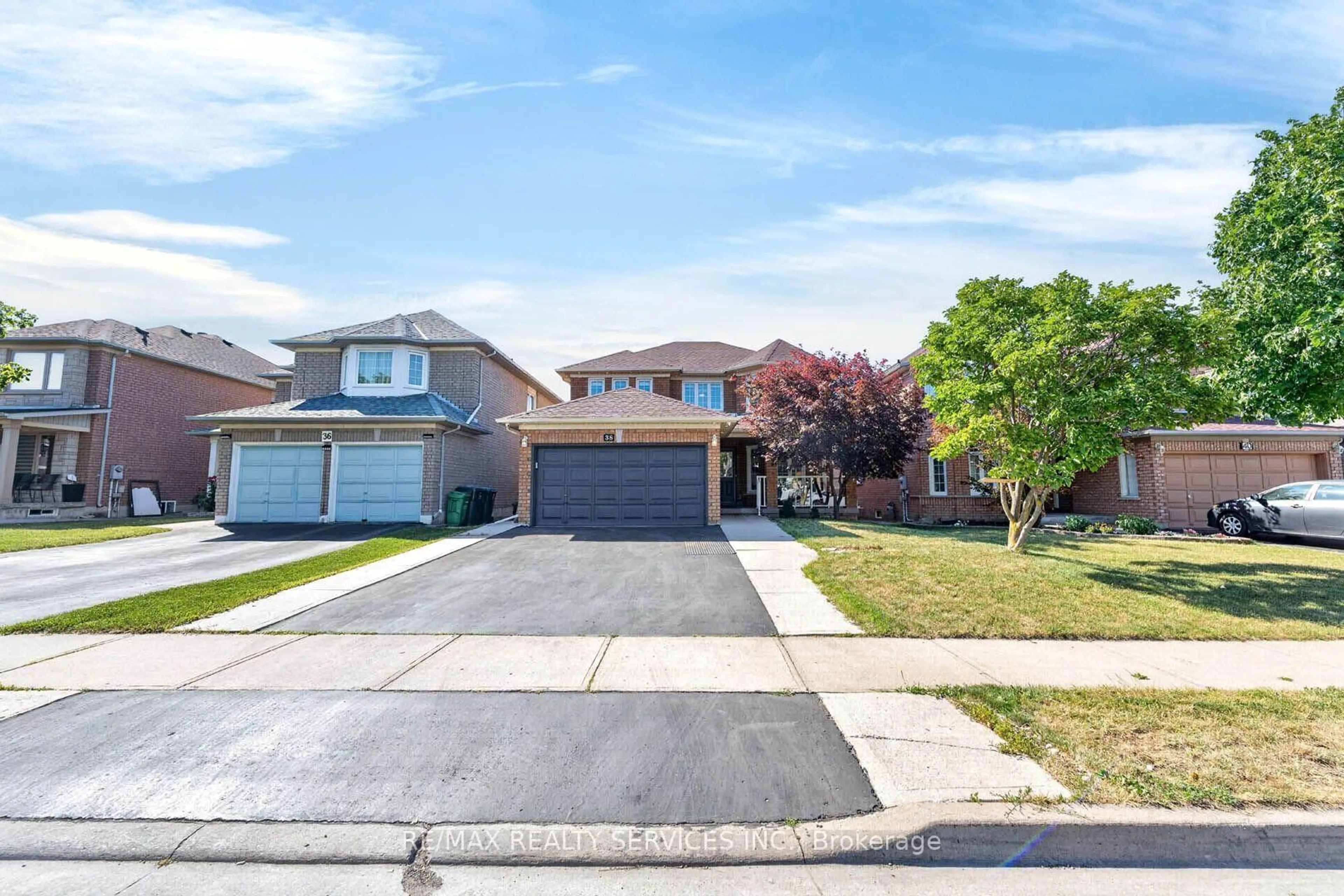 A pic from outside/outdoor area/front of a property/back of a property/a pic from drone, street for 38 Deerglen Dr, Brampton Ontario L6R 1M3