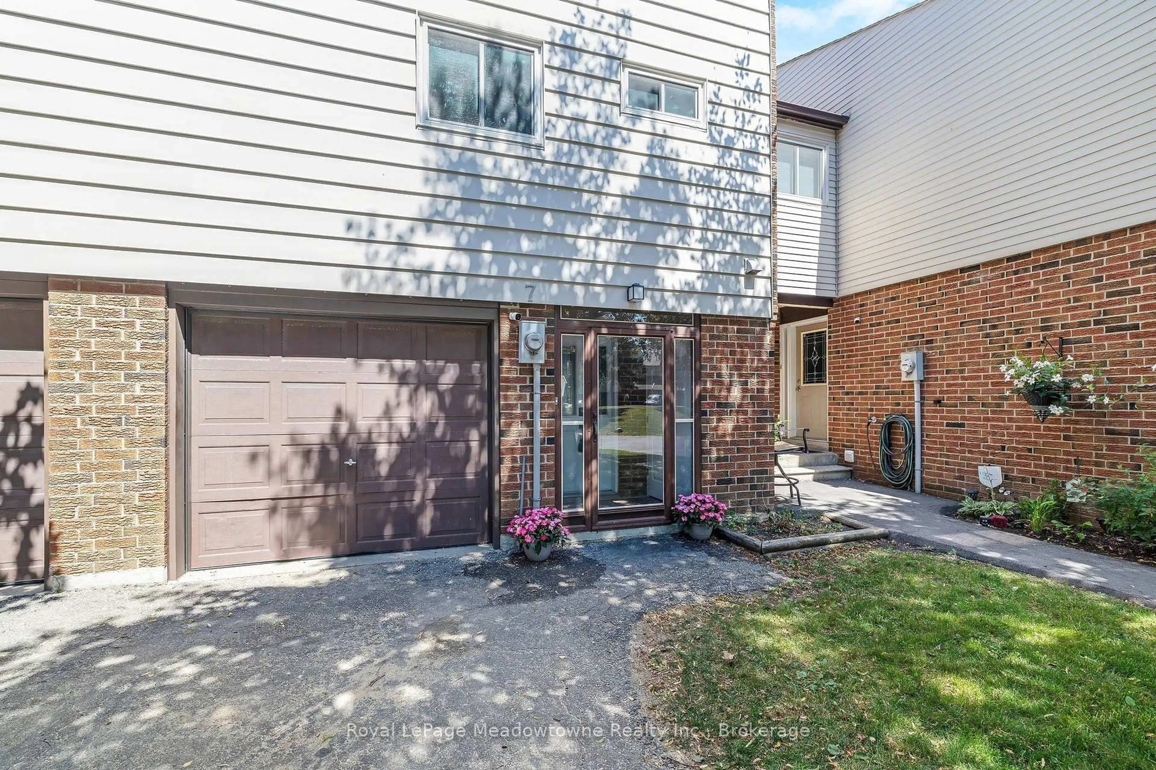 Home with brick exterior material, street for 550 Childs Dr #7, Milton Ontario L9T 3P3