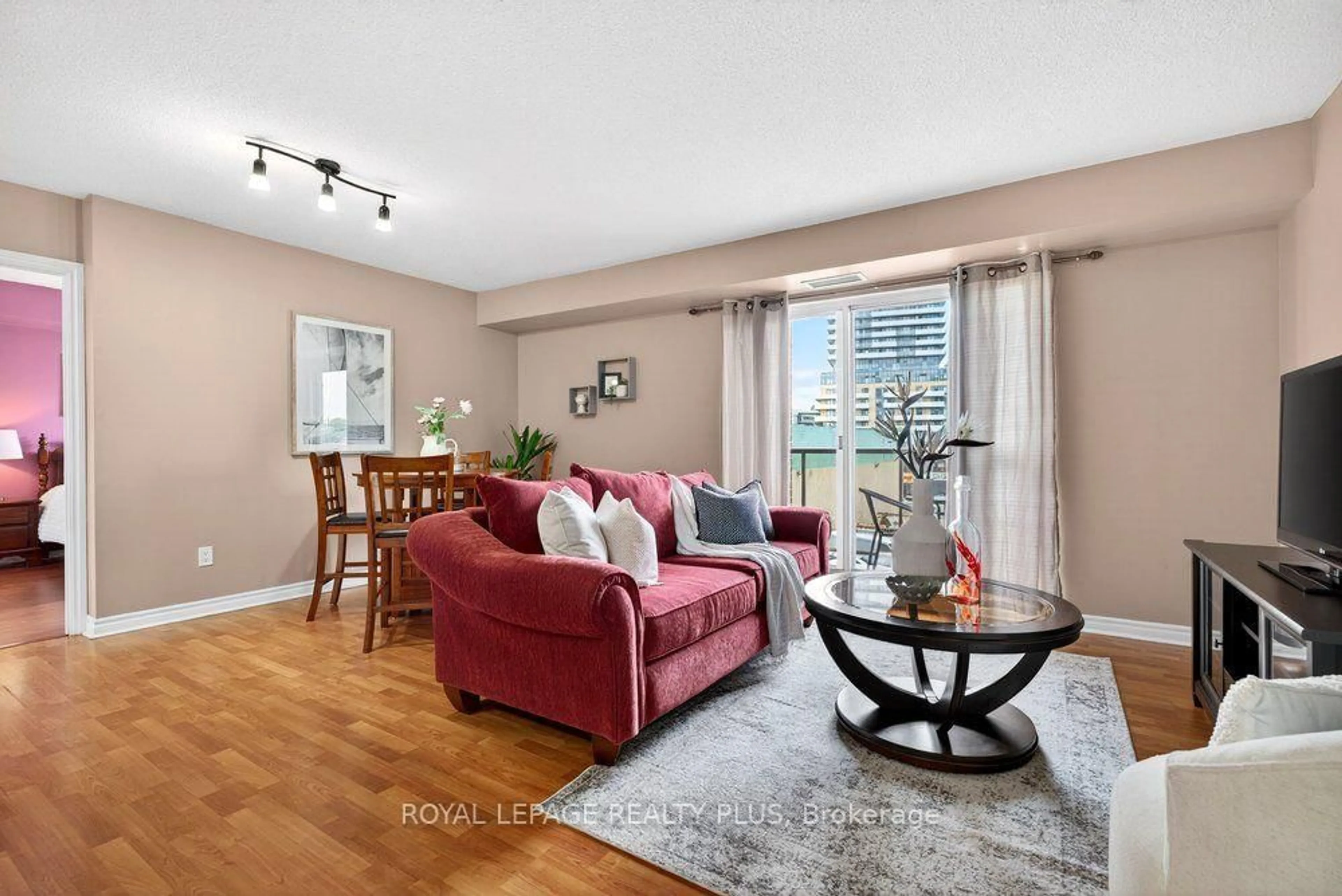 Living room with furniture, unknown for 2088 Lawrence Ave #412, Toronto Ontario M9N 3Z9
