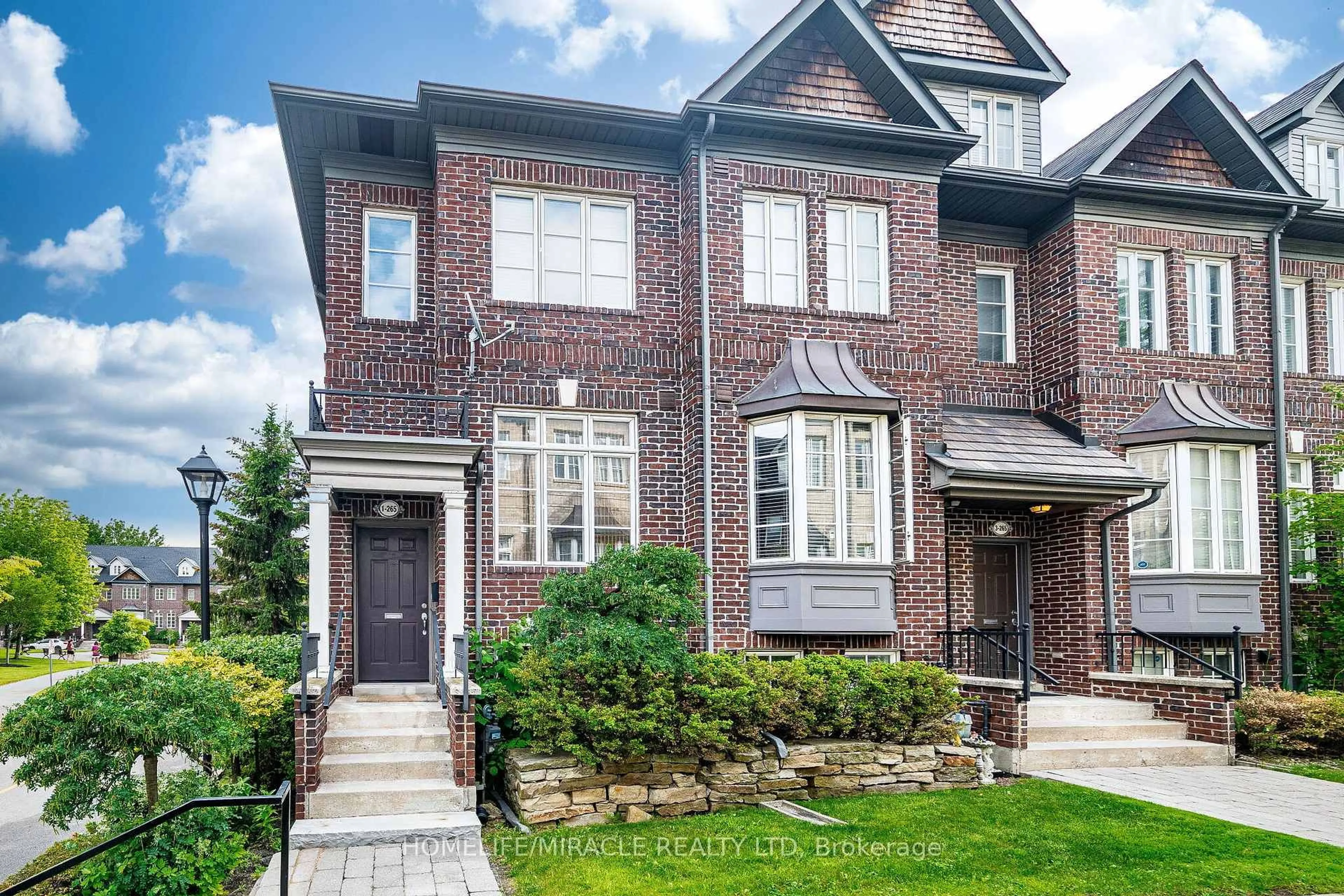 Home with brick exterior material, street for 265 Van Dusen Blvd #1, Toronto Ontario M8Z 3J2