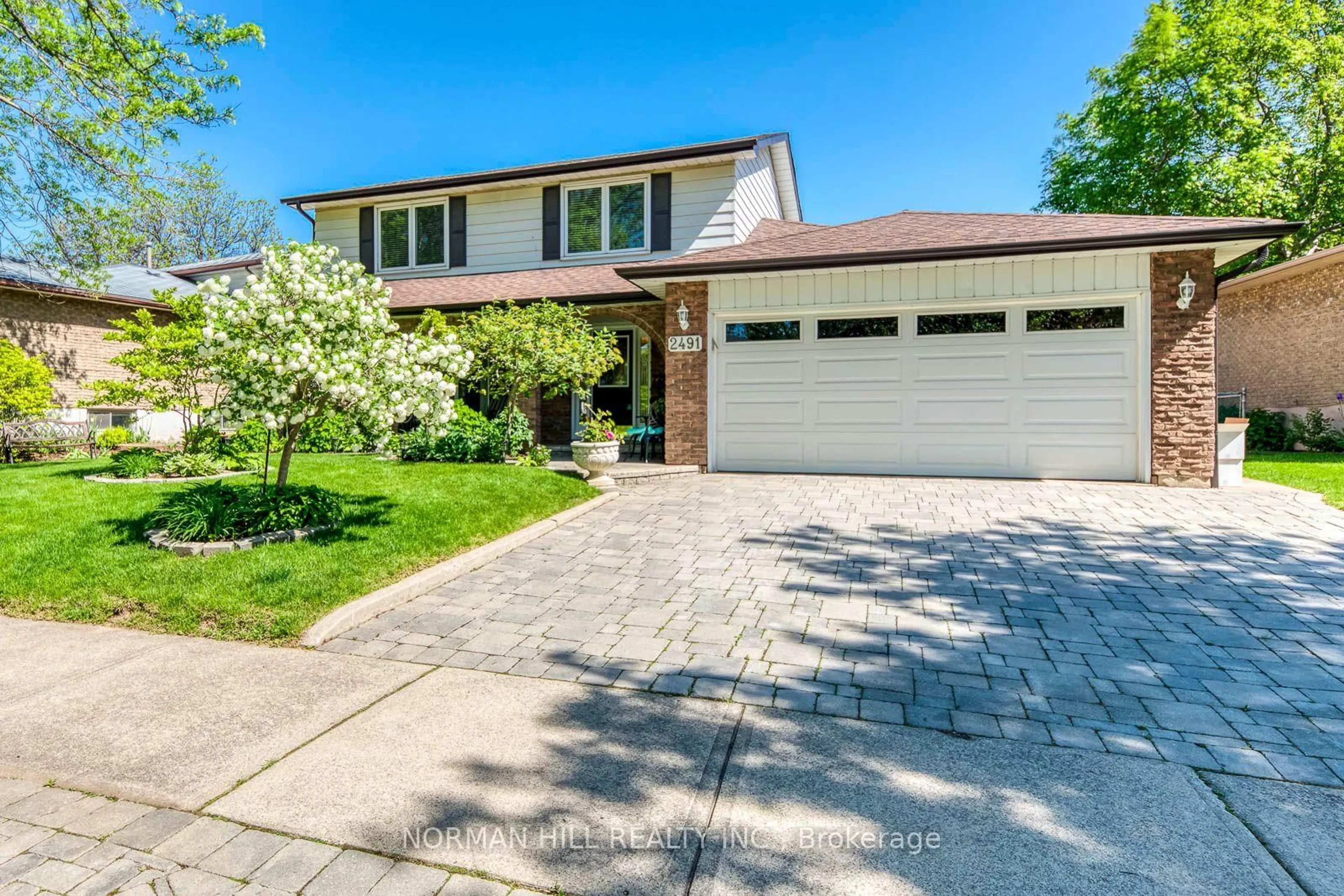 Home with brick exterior material, street for 2491 Woburn Cres, Oakville Ontario L6L 5E8