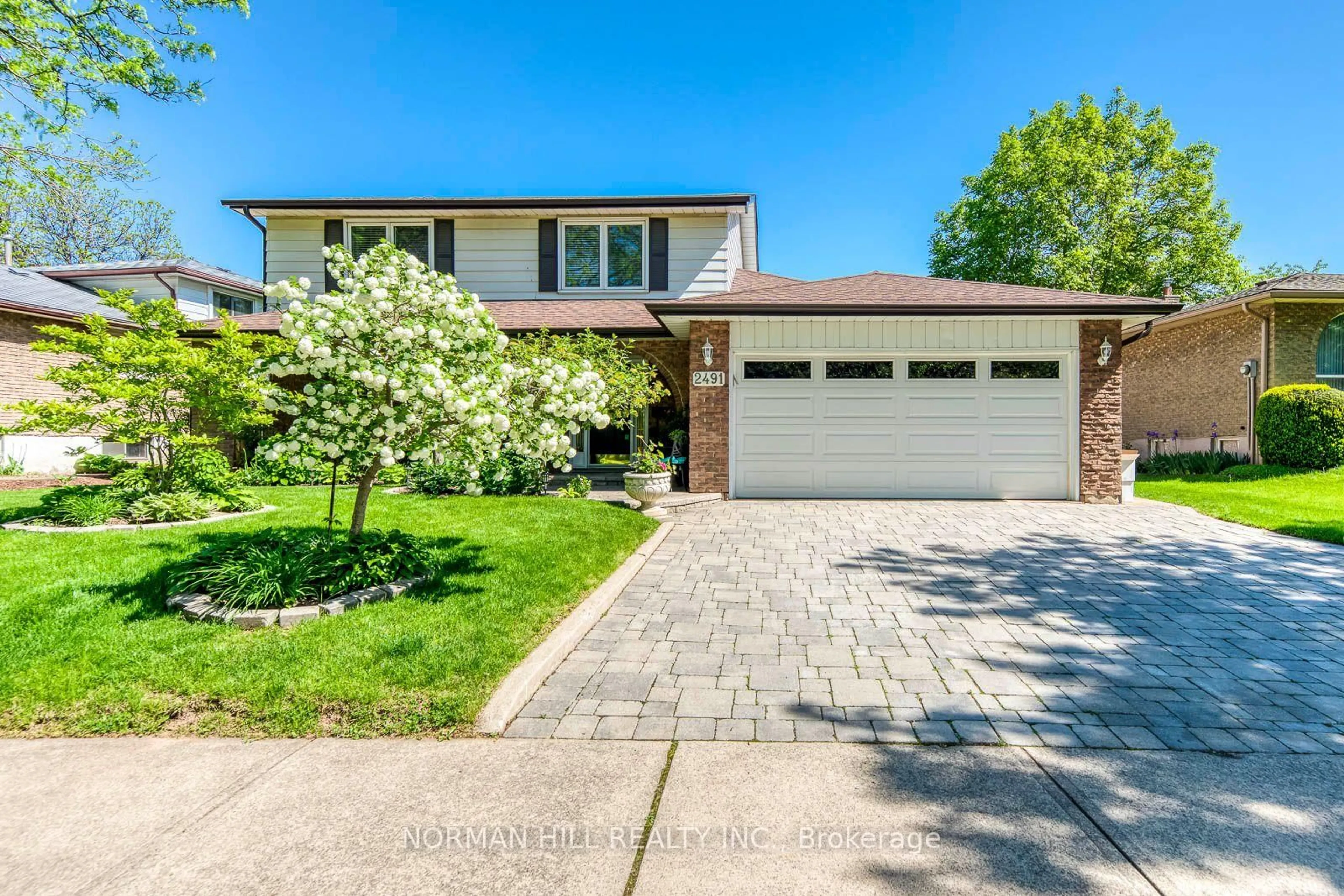 Home with brick exterior material, street for 2491 Woburn Cres, Oakville Ontario L6L 5E8