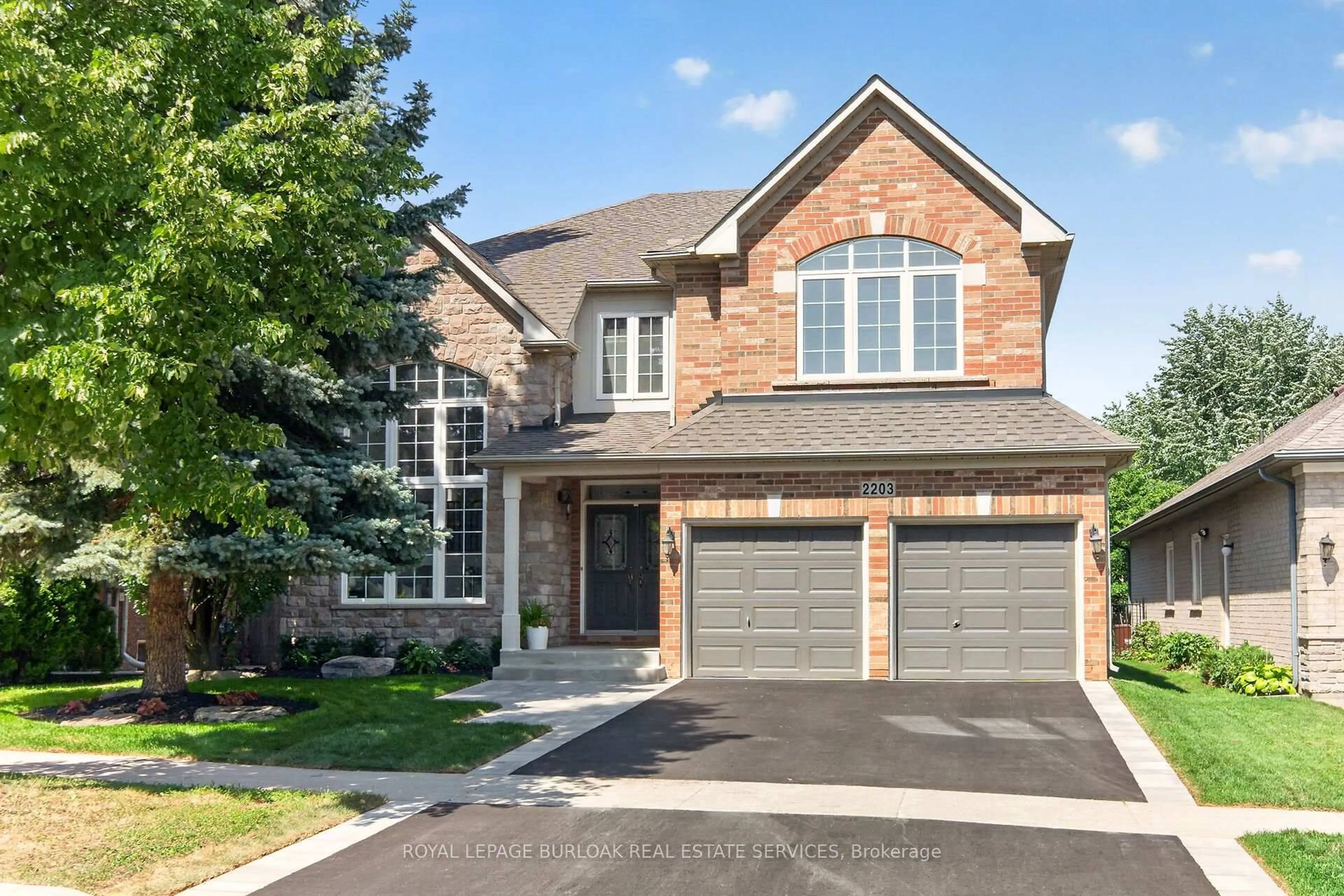 Home with brick exterior material, street for 2203 Turnberry Rd, Burlington Ontario L7M 4P9