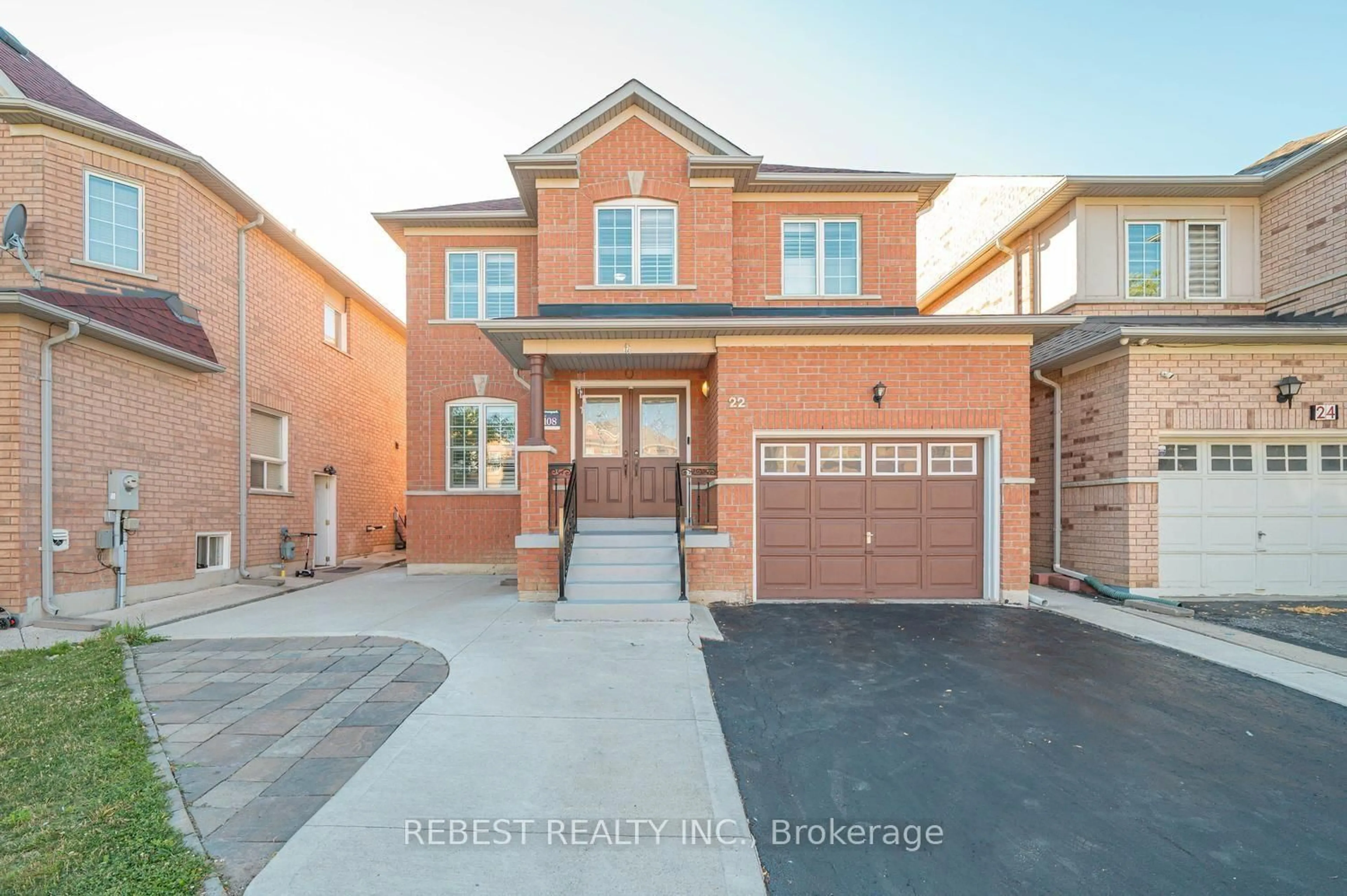 Home with brick exterior material, street for 22 Gore Valley Tr, Brampton Ontario L6P 1N7