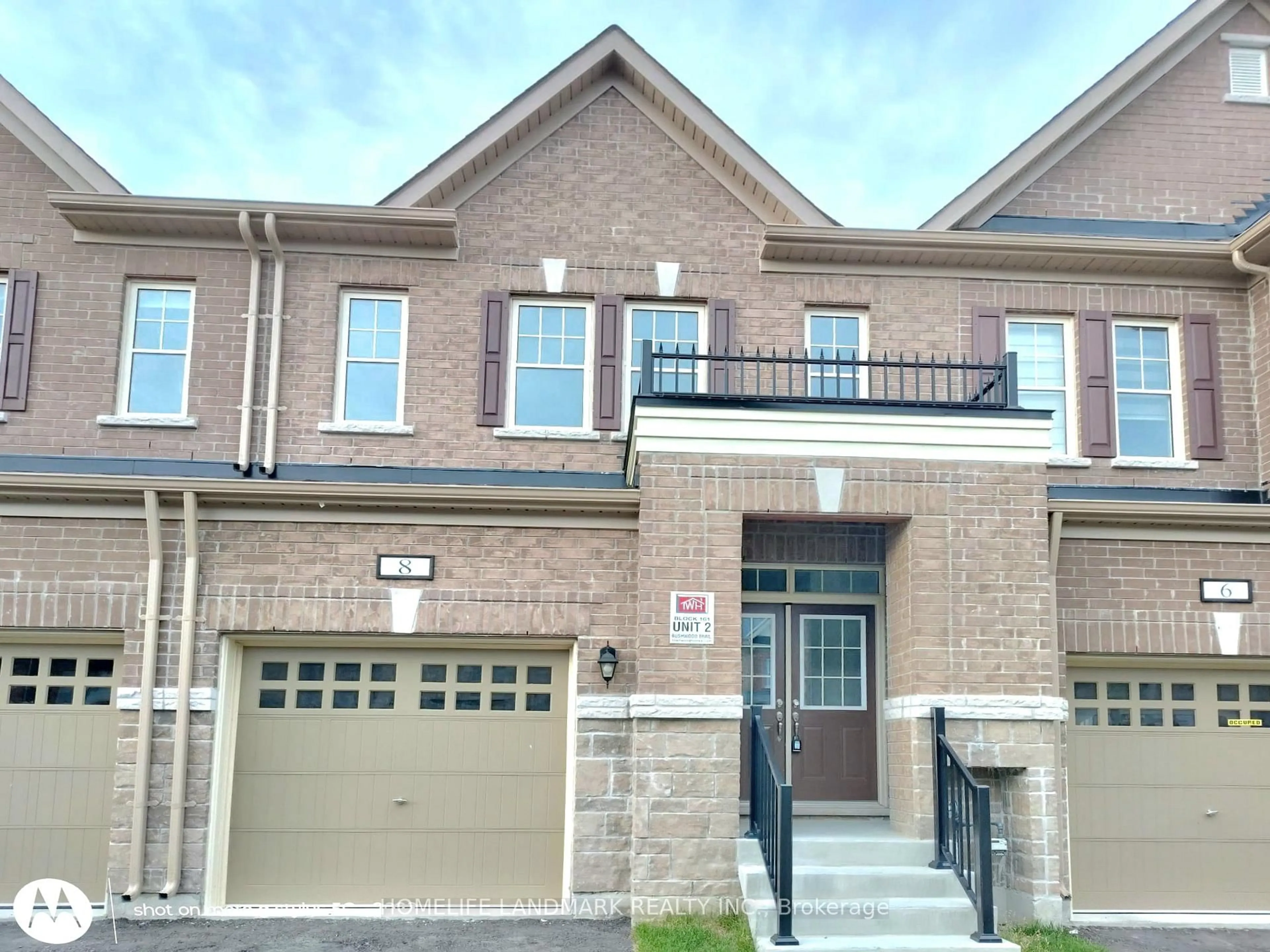 Home with brick exterior material, street for 8 Bushwood Tr, Brampton Ontario L7A 5J7