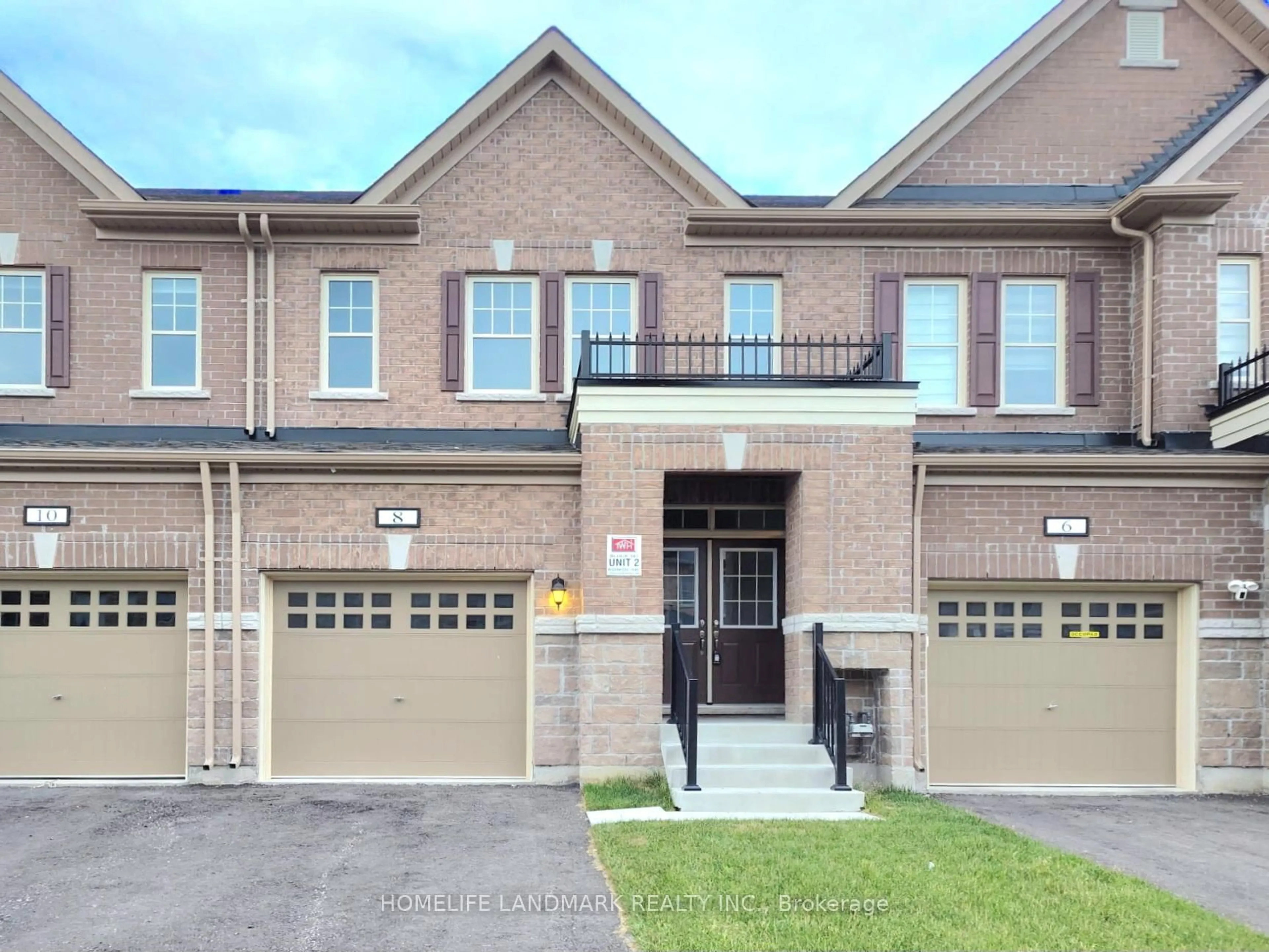 Home with brick exterior material, street for 8 Bushwood Tr, Brampton Ontario L7A 5J7