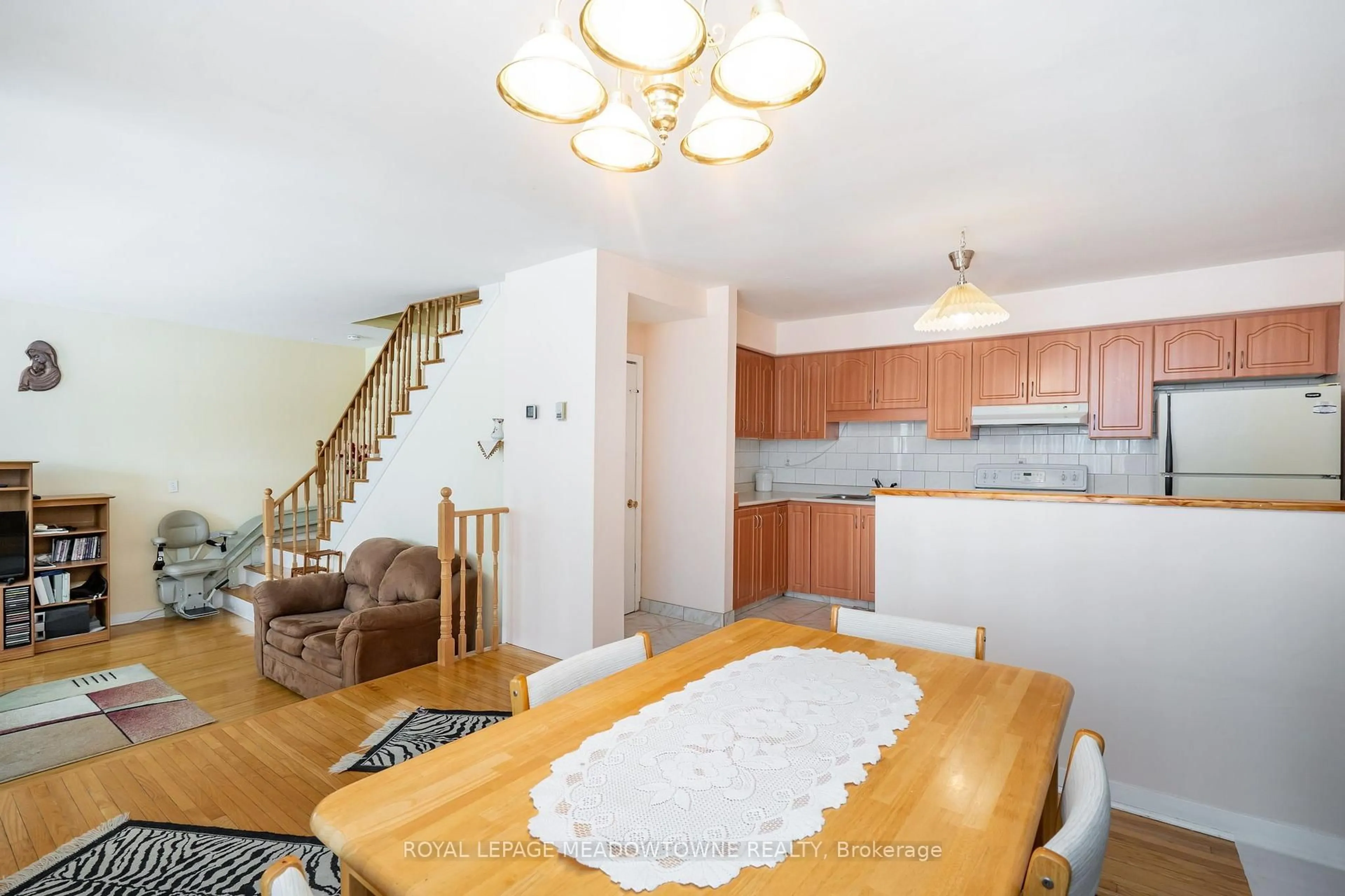 Dining room, wood/laminate floor for 61 Ardglen Dr #19, Brampton Ontario L6W 1V1