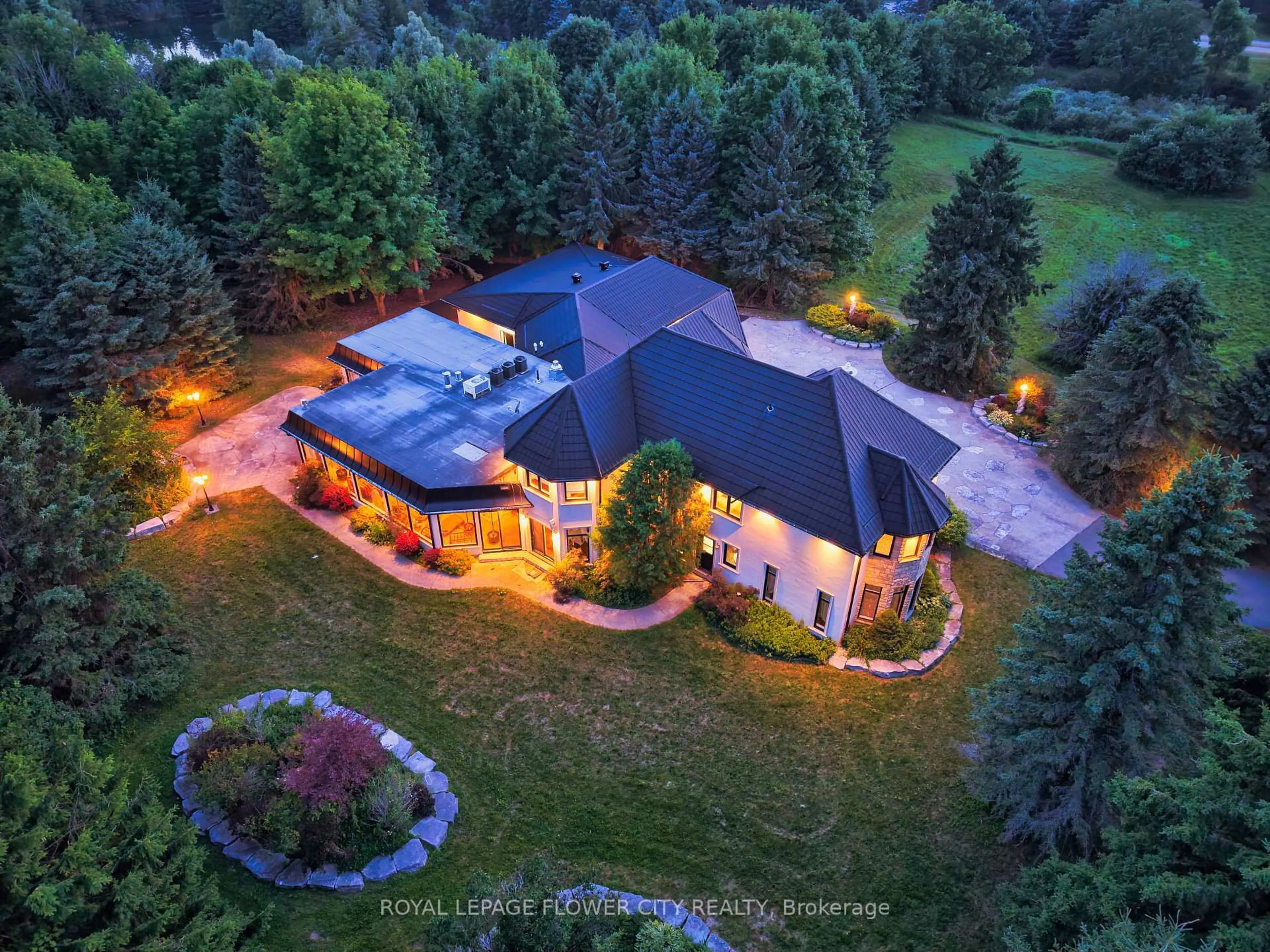 A pic from outside/outdoor area/front of a property/back of a property/a pic from drone, unknown for 1 Flaherty Lane, Caledon Ontario L7K 2P2