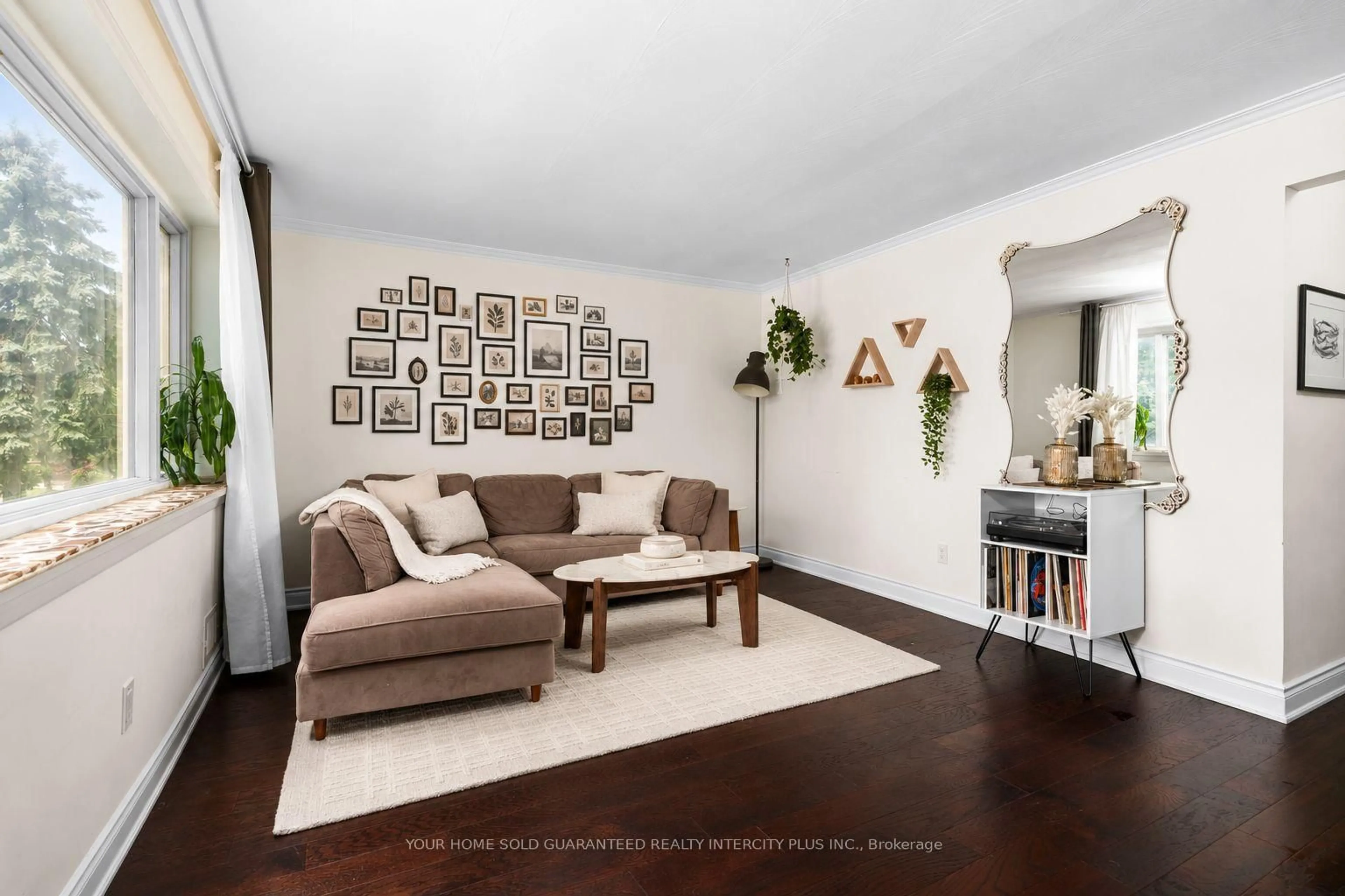 Living room with furniture, wood/laminate floor for 30 Garside Cres, Toronto Ontario M6M 2Z6