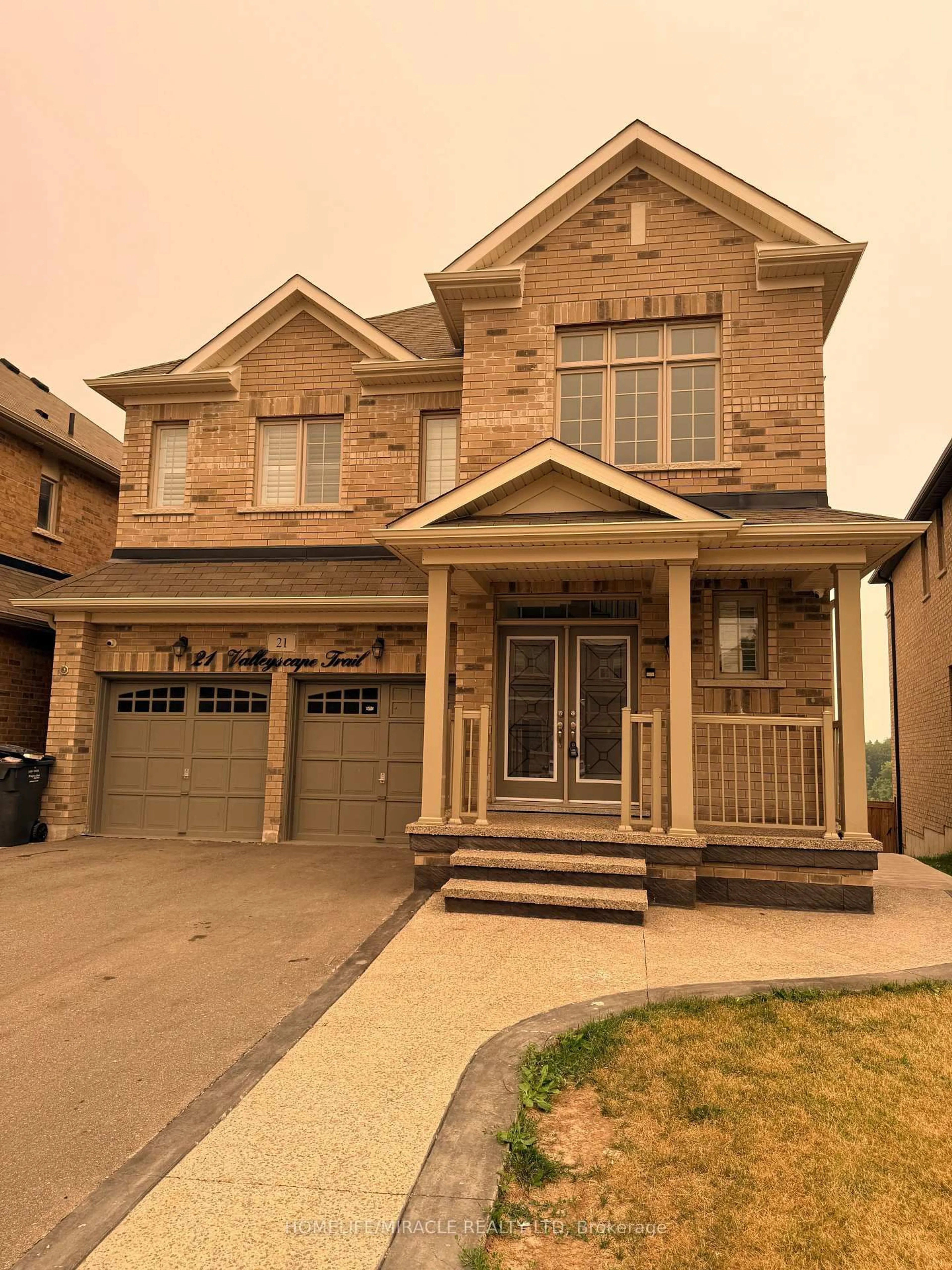 Home with brick exterior material, street for 21 Valleyscape Tr, Caledon Ontario L7C 4H3