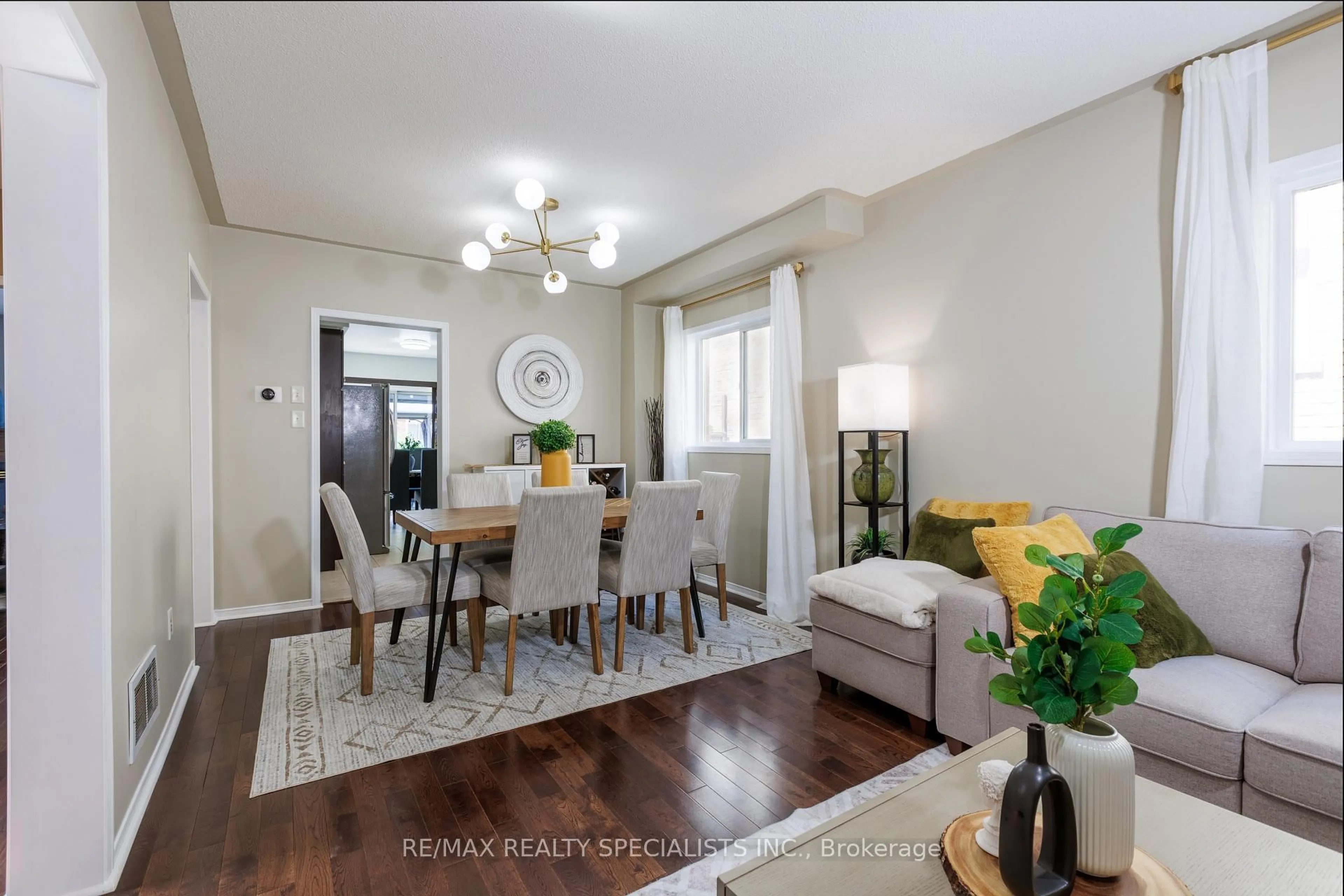Dining room, wood/laminate floor for 178 Binder Twine Tr, Brampton Ontario L6X 4V6