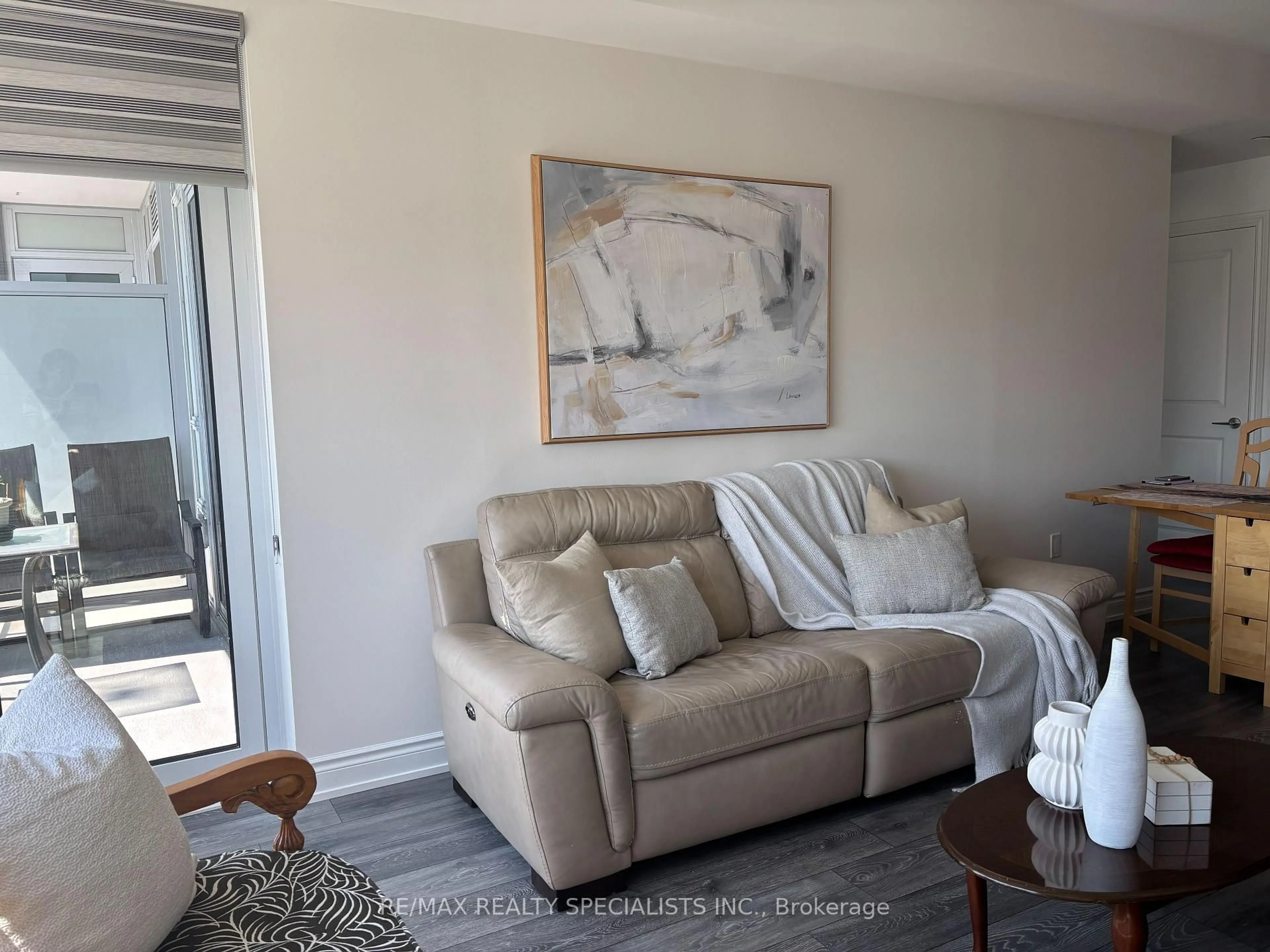 Living room with furniture, unknown for 1050 Main St #226, Milton Ontario L9T 9M3