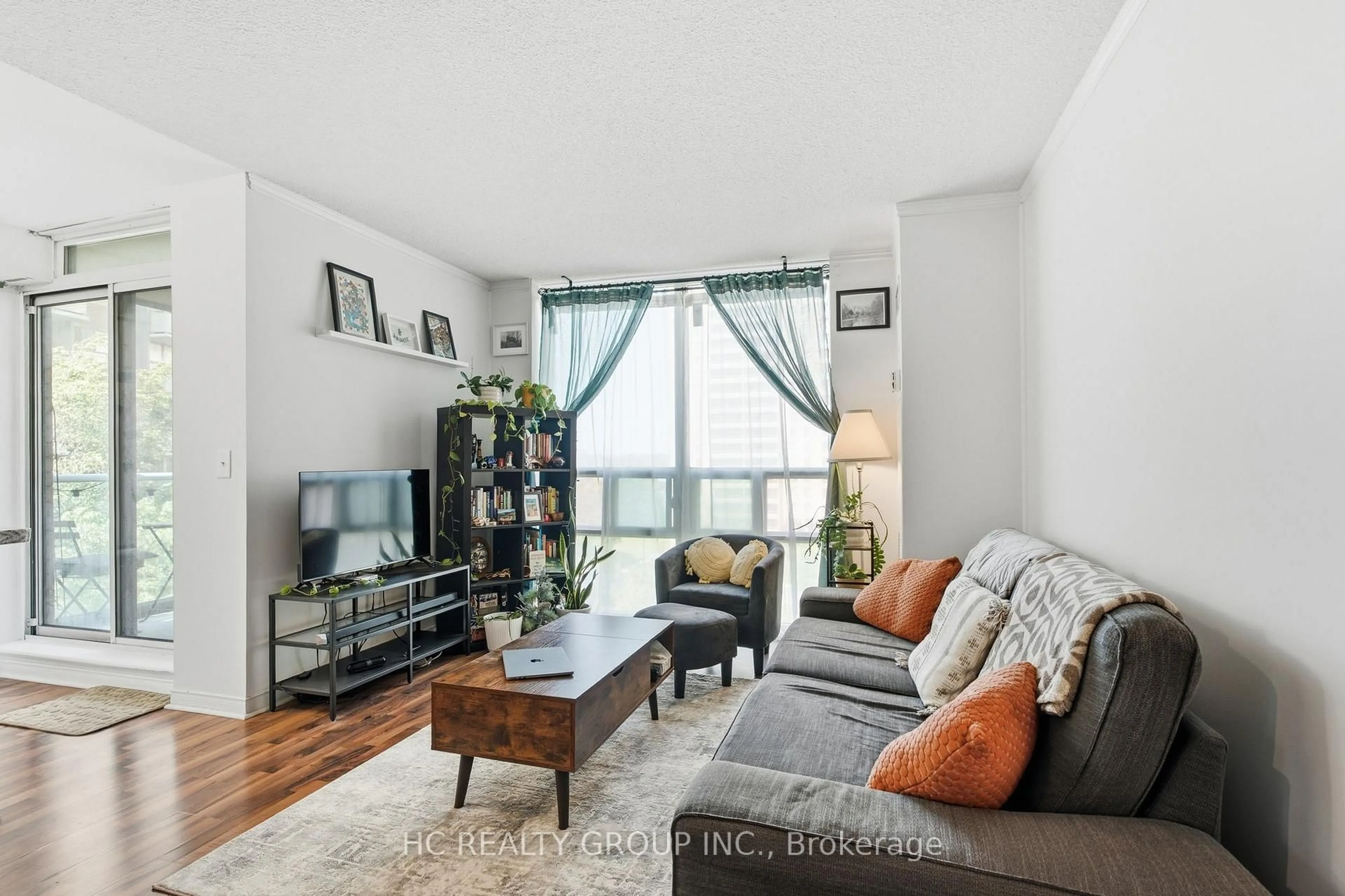 Living room with furniture, unknown for 17 Michael Power Pl #713, Toronto Ontario M9A 5G5