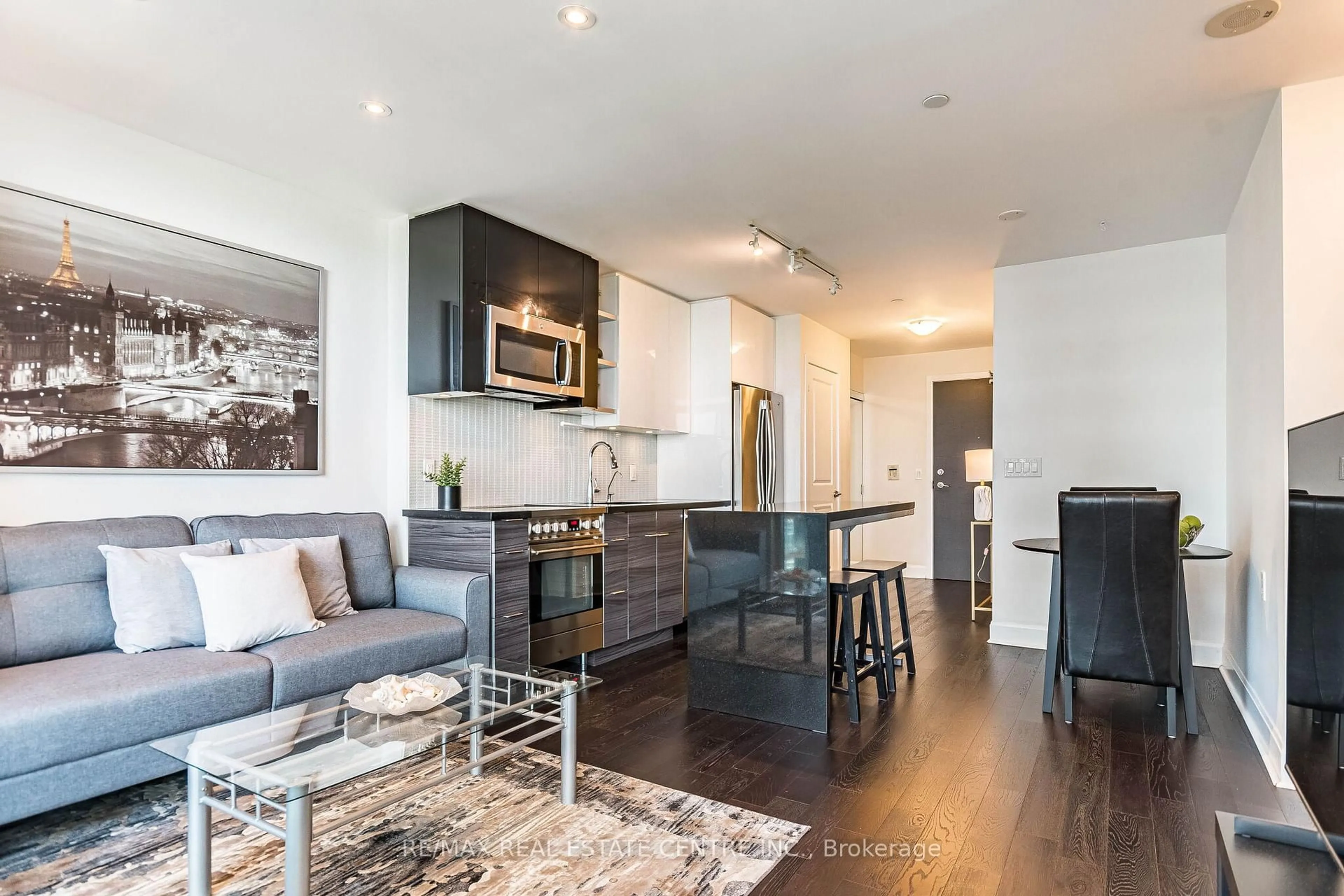 Open concept kitchen, wood/laminate floor for 33 Shore Breeze Dr #2102, Toronto Ontario M8V 0G1
