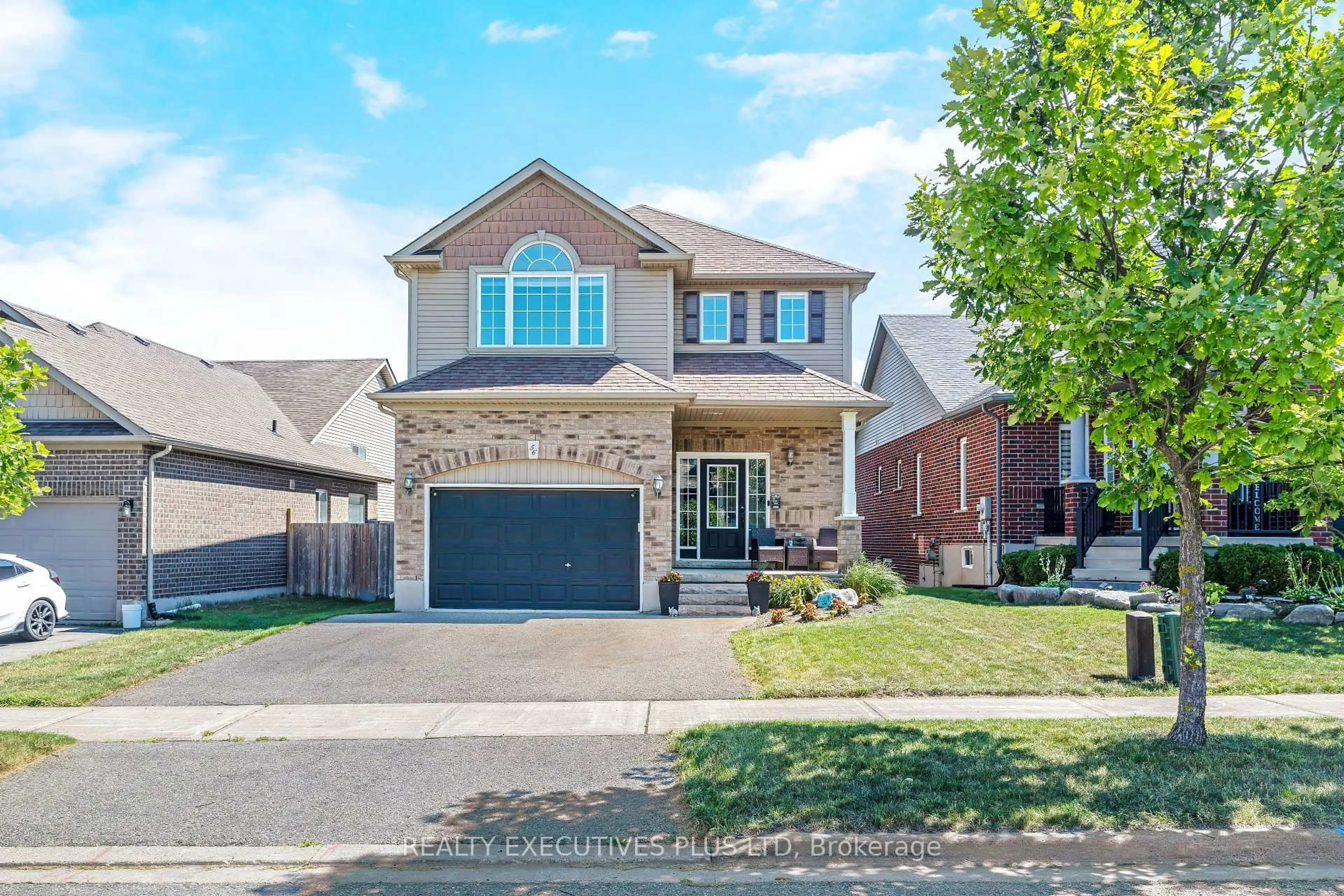 Home with brick exterior material, street for 56 Dinnick Cres, Orangeville Ontario L9W 0B7