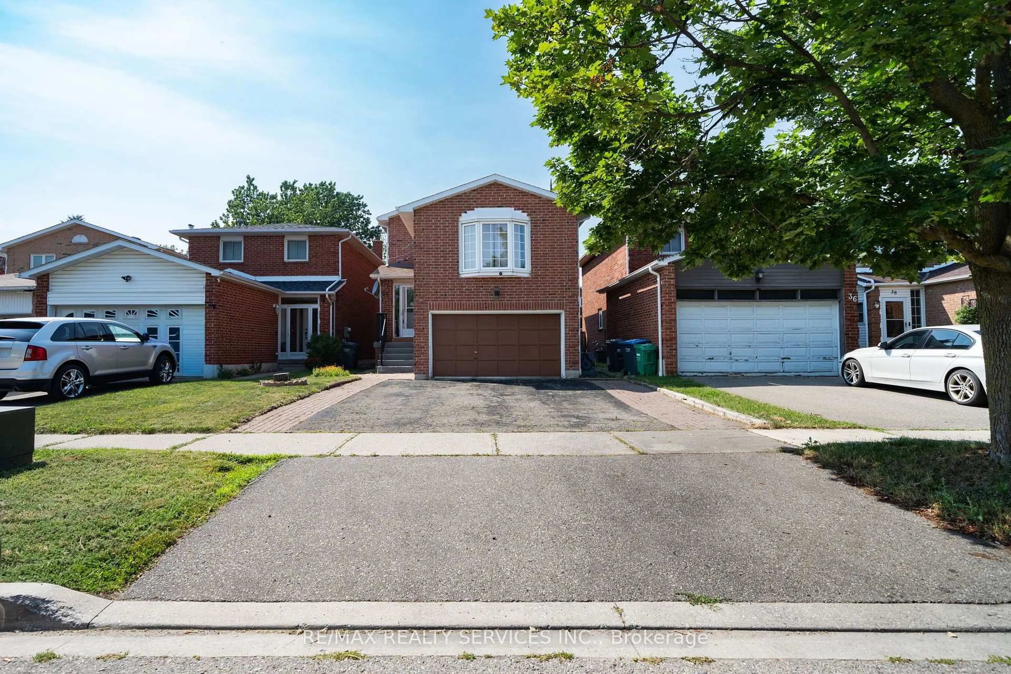 Home with brick exterior material, street for 34 Clarridge Crt, Brampton Ontario L6X 3N5