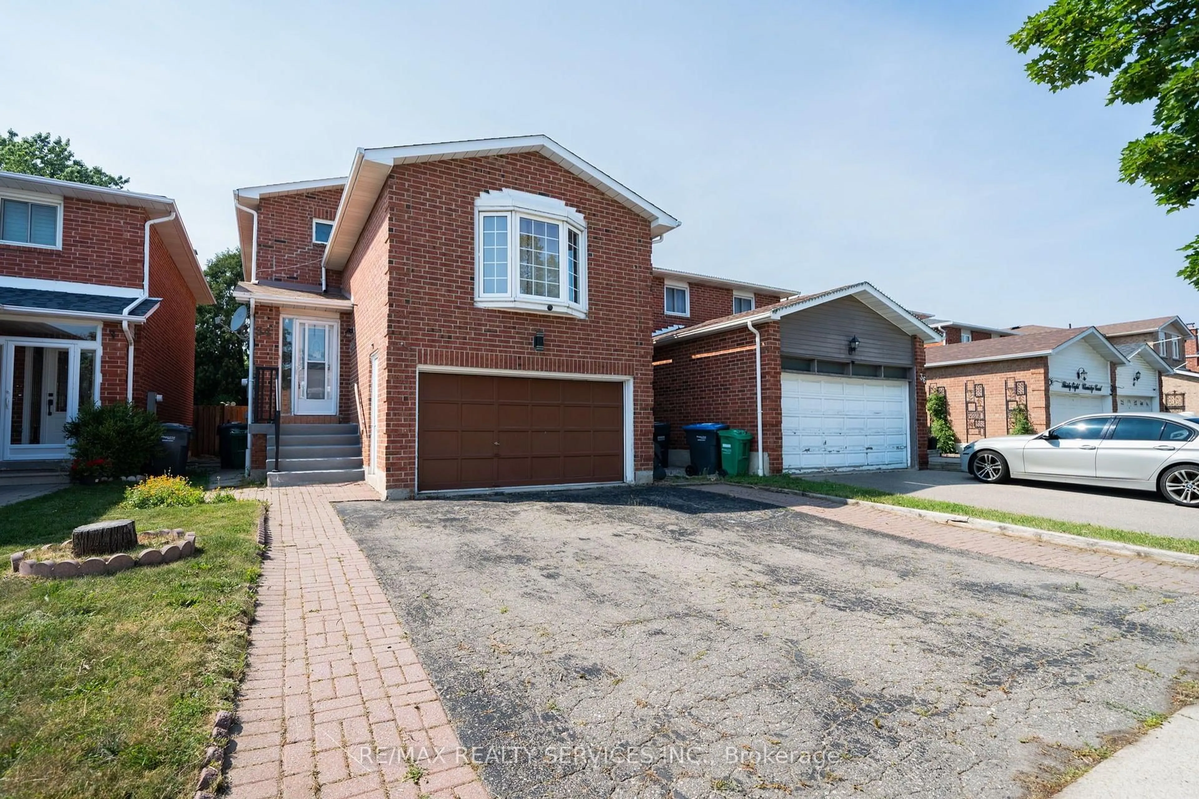 Home with brick exterior material, street for 34 Clarridge Crt, Brampton Ontario L6X 3N5