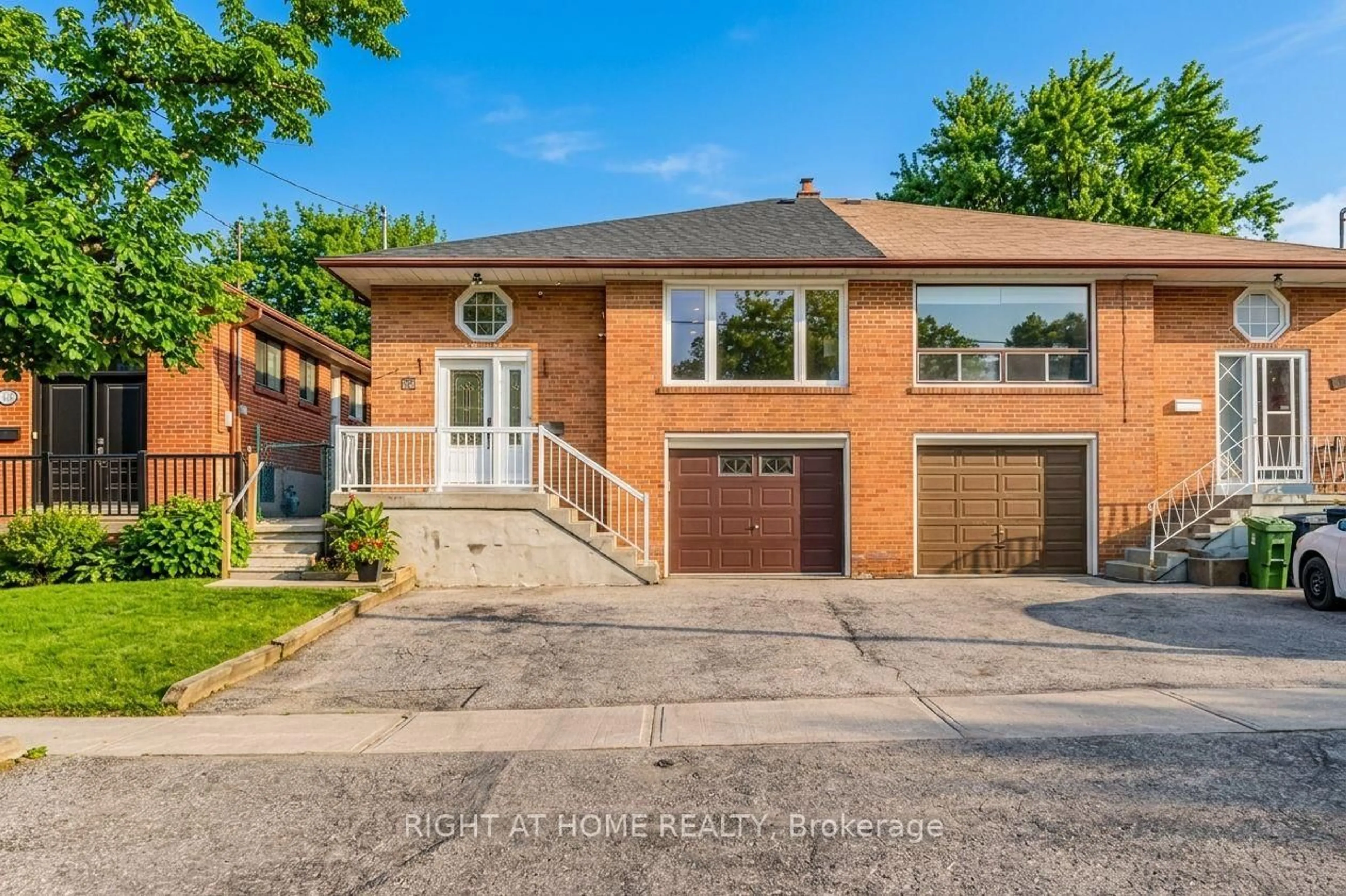 Home with brick exterior material, street for 110 Victory Dr, Toronto Ontario M3M 2J8