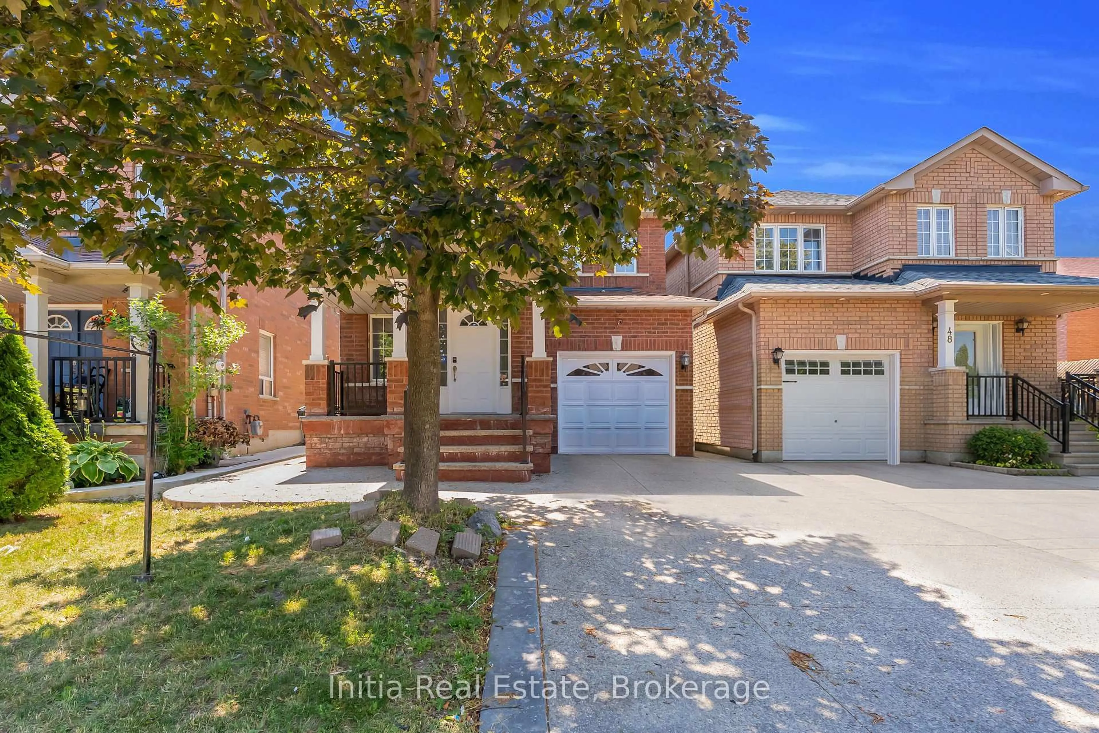 Home with brick exterior material, street for 46 Florence Dr, Brampton Ontario L7A 2M2
