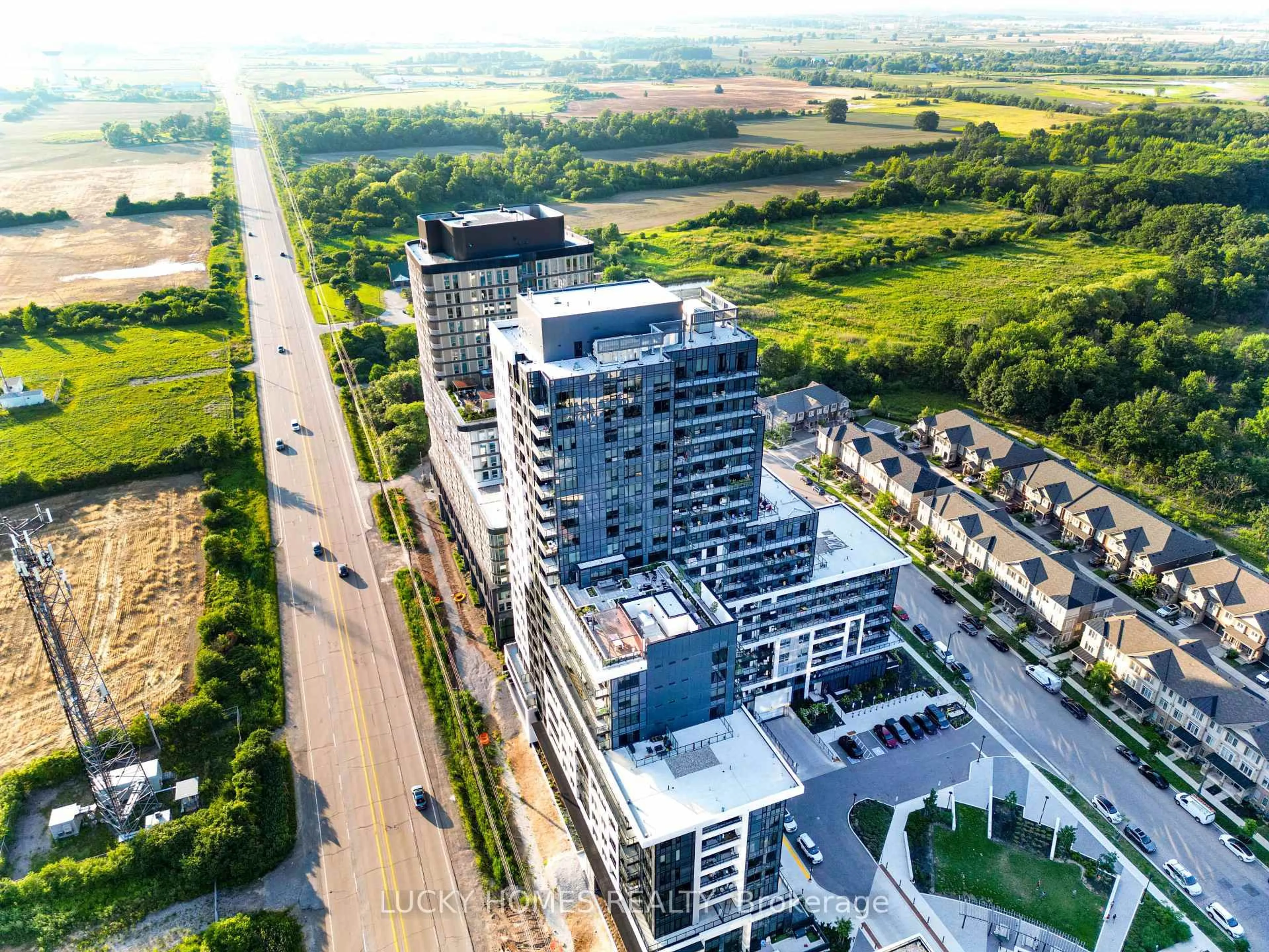 A pic from outside/outdoor area/front of a property/back of a property/a pic from drone, city buildings view from balcony for 3220 William Coltson Ave #315, Oakville Ontario L6H 7X9