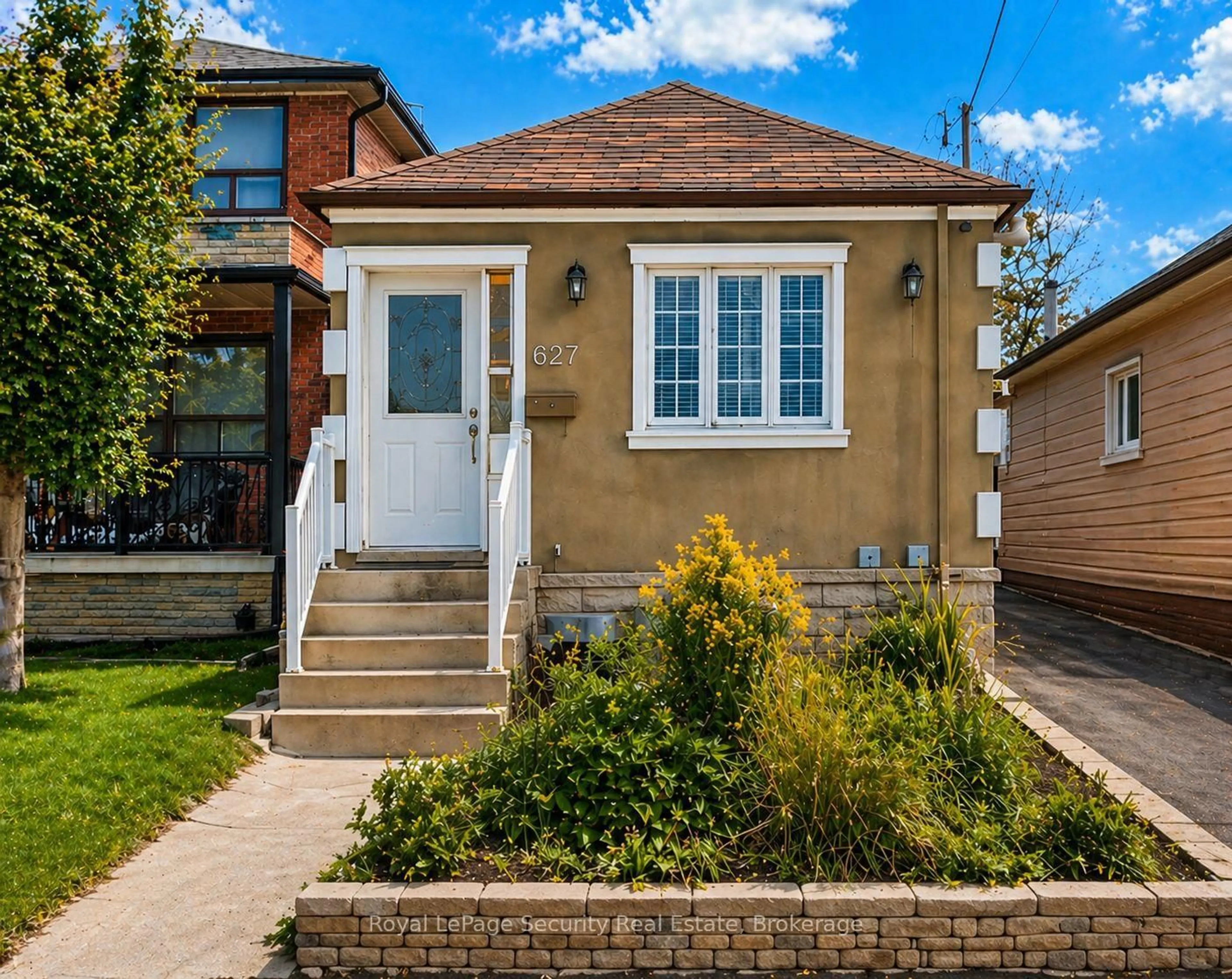 Home with brick exterior material, street for 627 Caledonia Rd, Toronto Ontario M6E 4V7