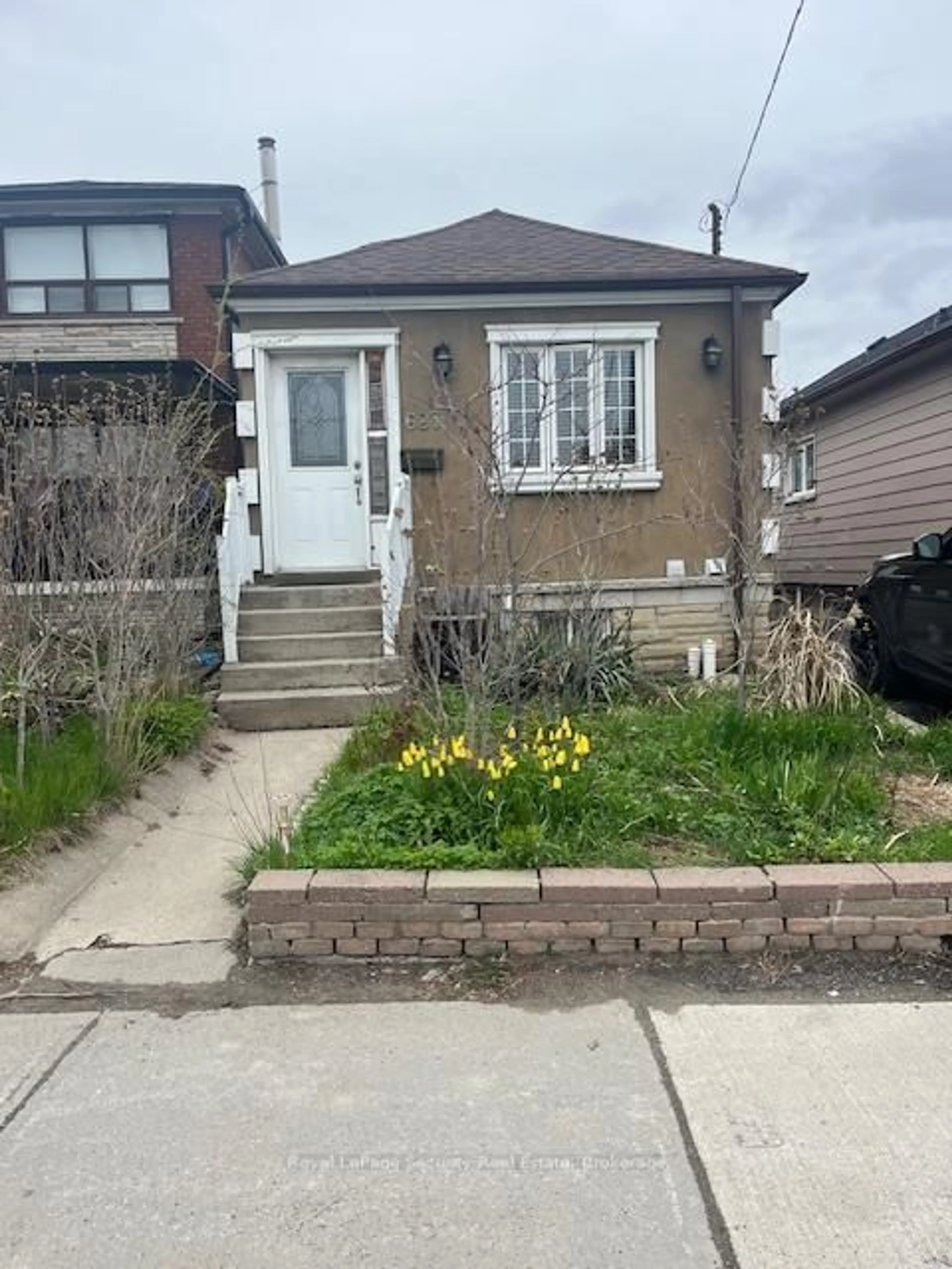 Home with brick exterior material, street for 627 Caledonia Rd, Toronto Ontario M6E 4V7