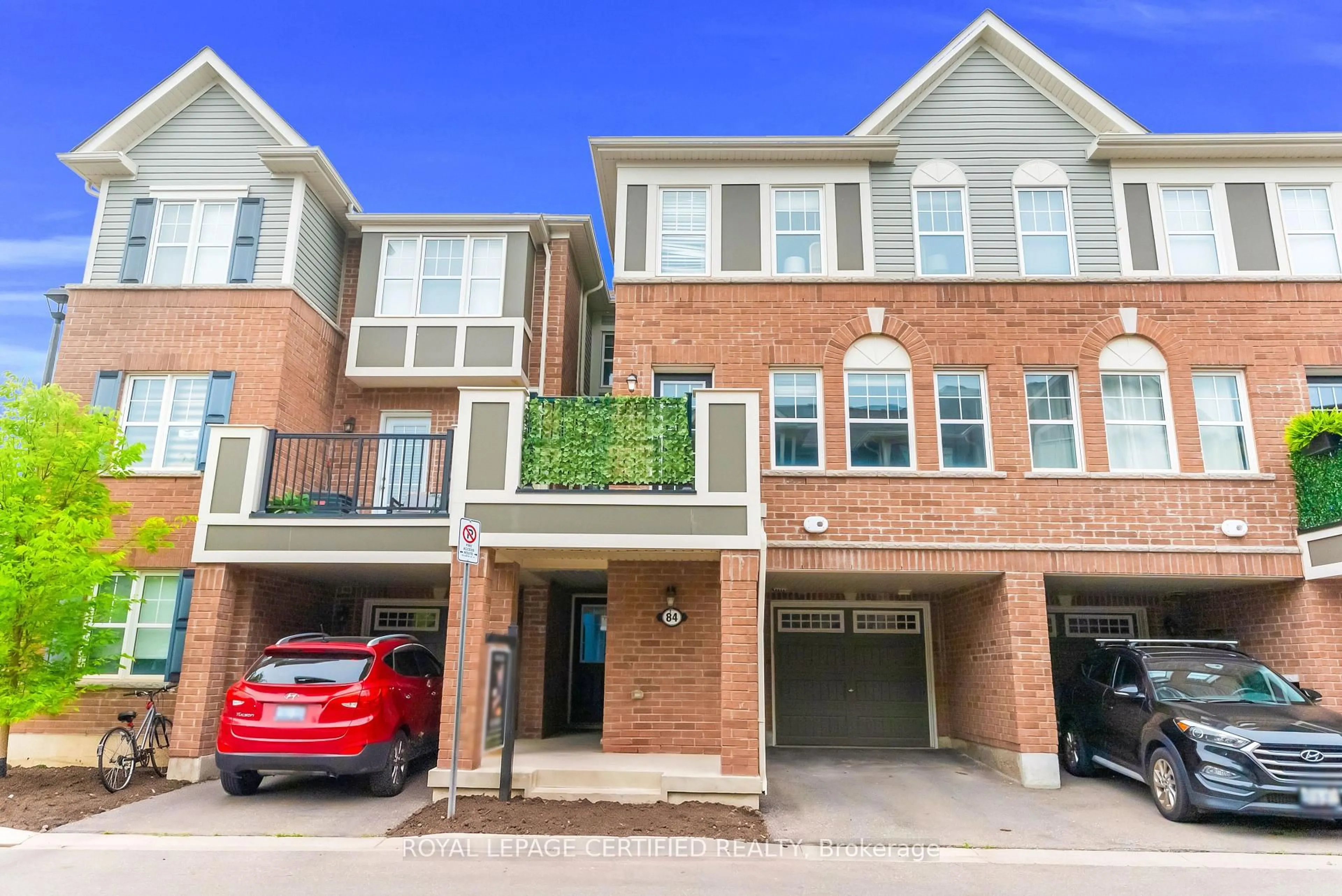 Home with brick exterior material, street for 1000 Asleton Blvd #84, Milton Ontario L9T 9L2