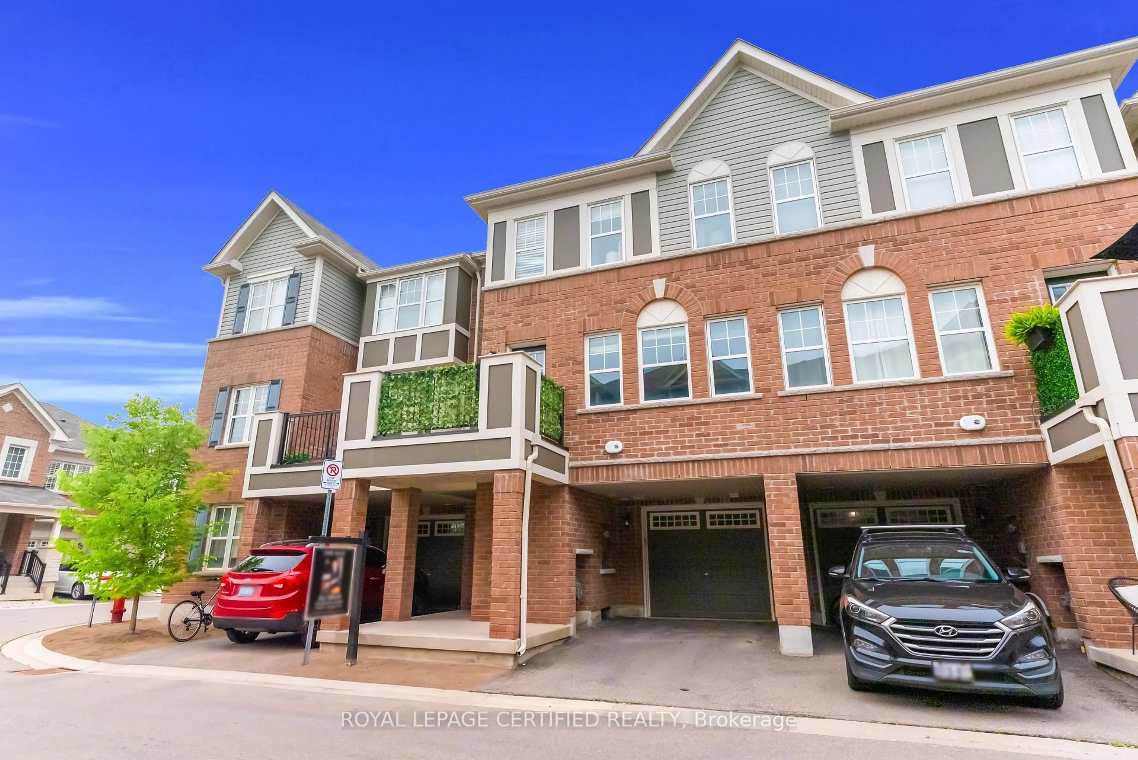 Home with brick exterior material, street for 1000 Asleton Blvd #84, Milton Ontario L9T 9L2