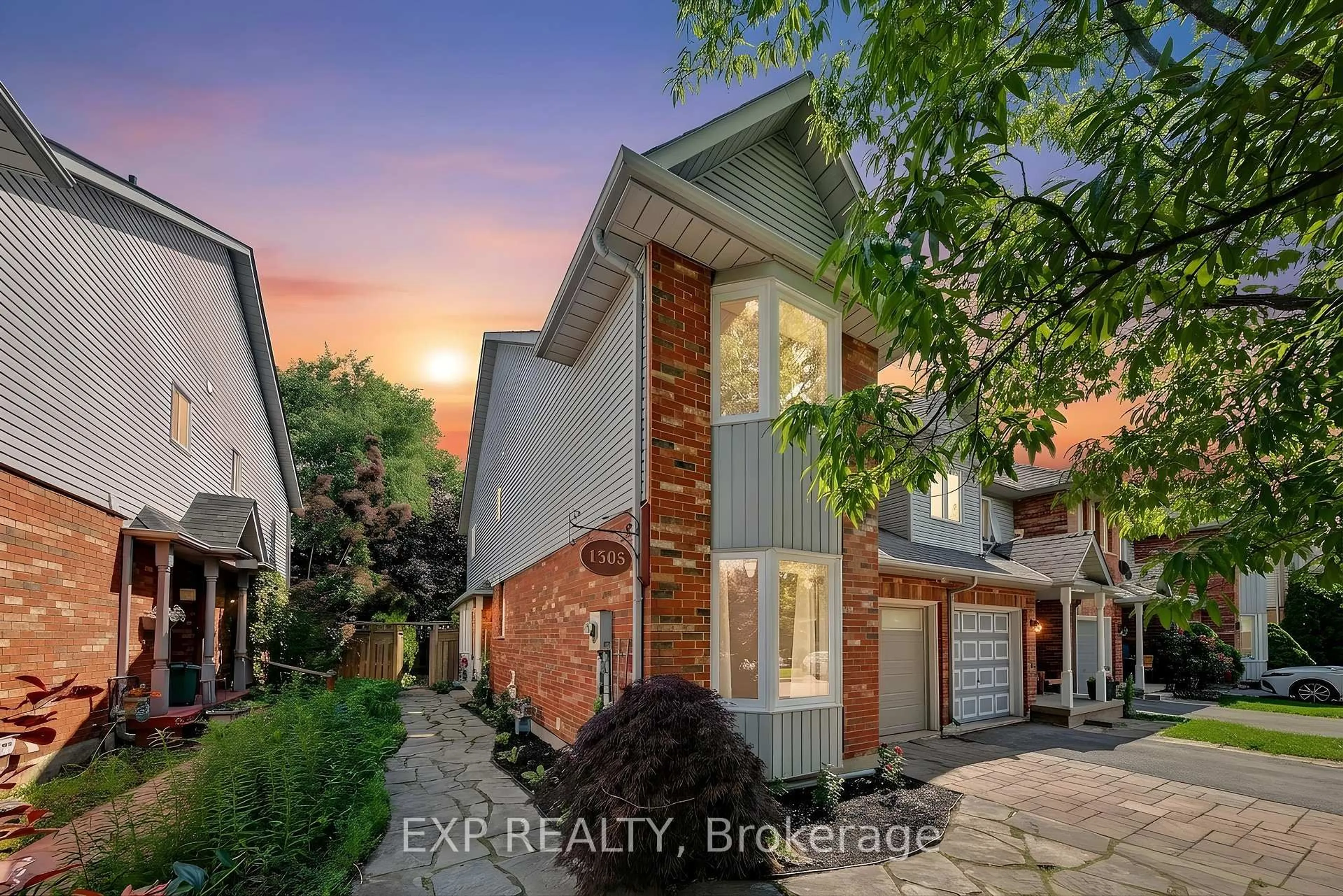 Home with brick exterior material, street for 1305 Walker's Line, Burlington Ontario L7M 4N7