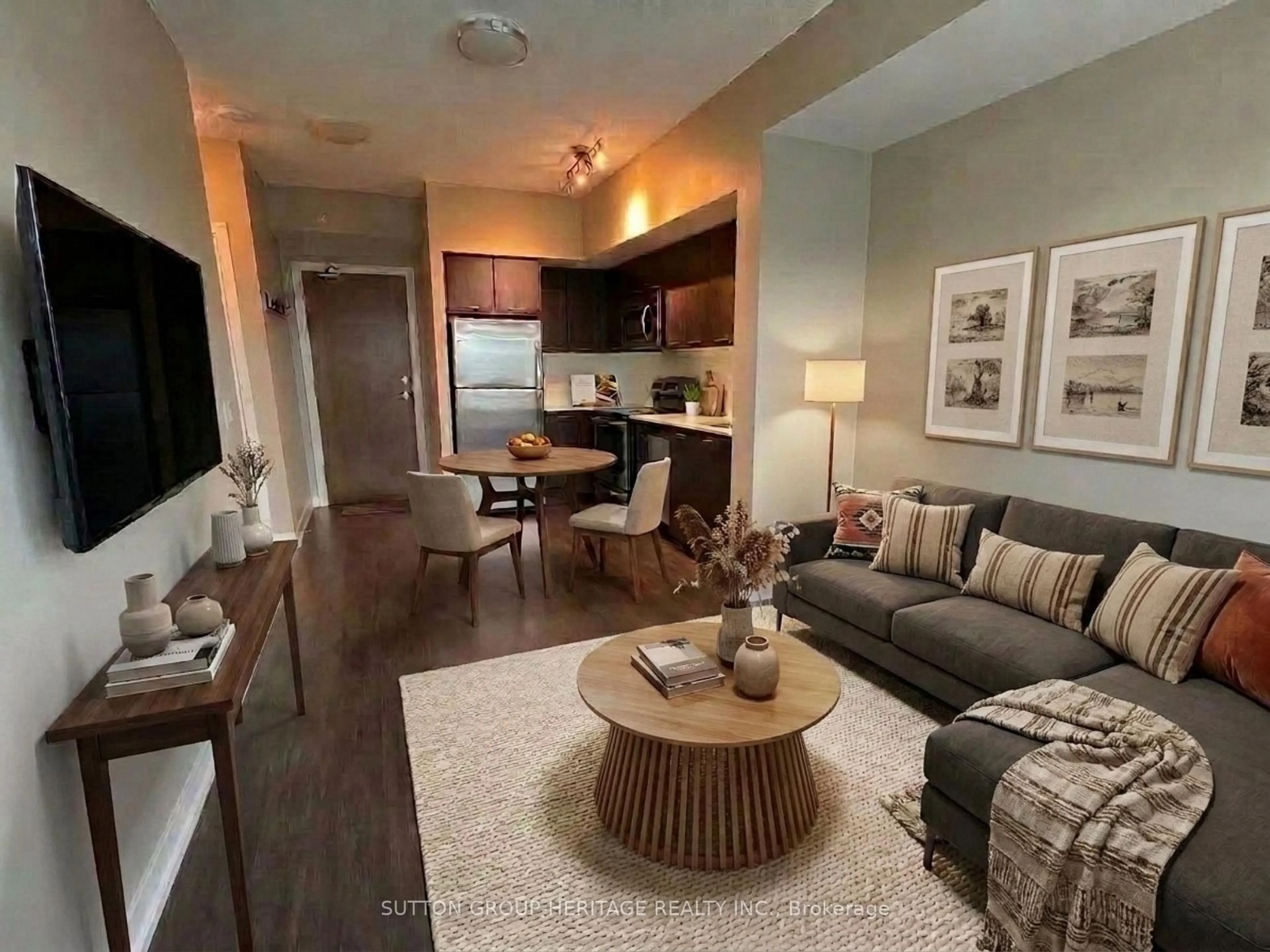 Living room with furniture, wood/laminate floor for 2212 Lake Shore Blvd #907, Toronto Ontario M8V 0C2