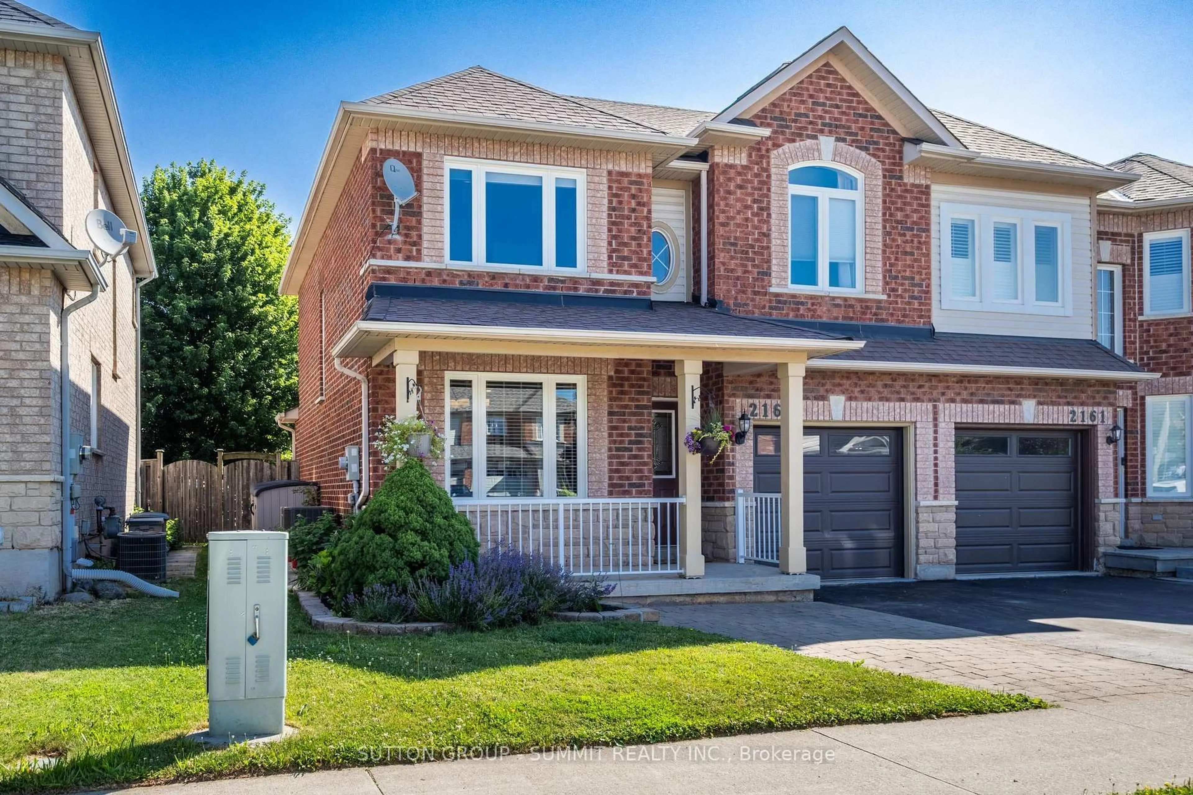 Home with brick exterior material, street for 2163 SUTTON Dr, Burlington Ontario L7L 7K5