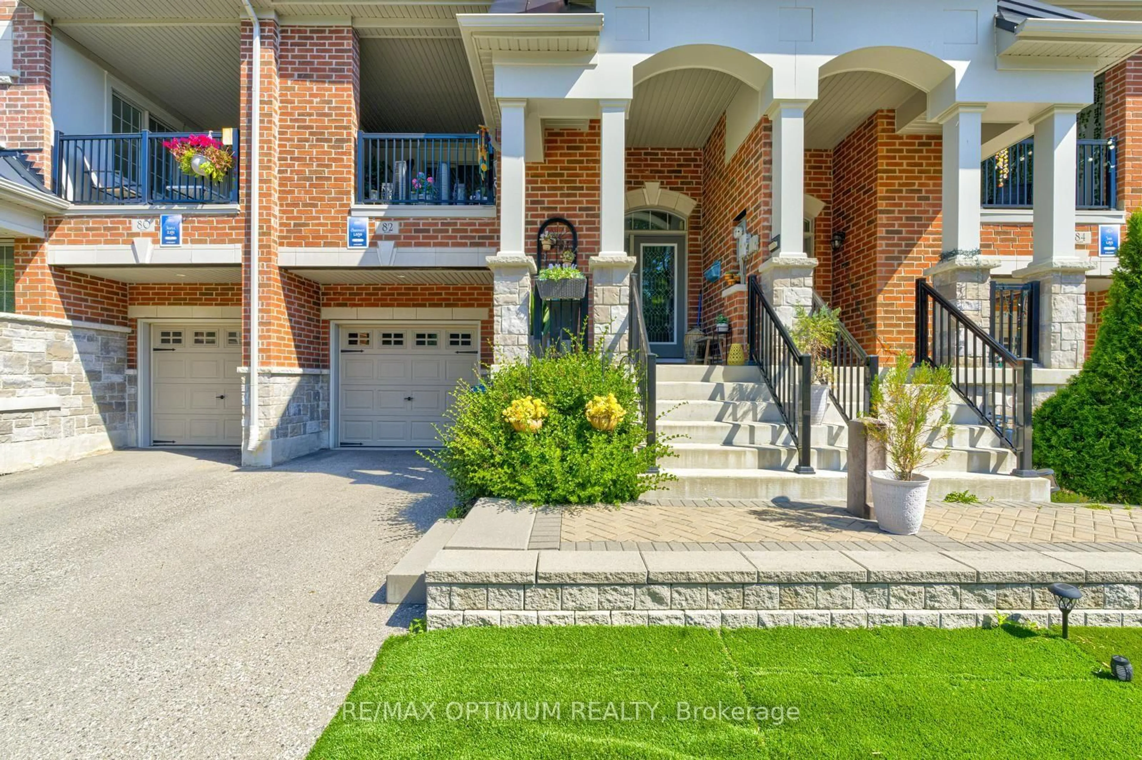 Home with brick exterior material, street for 82 Oakmore Lane, Brampton Ontario L6Y 6H5