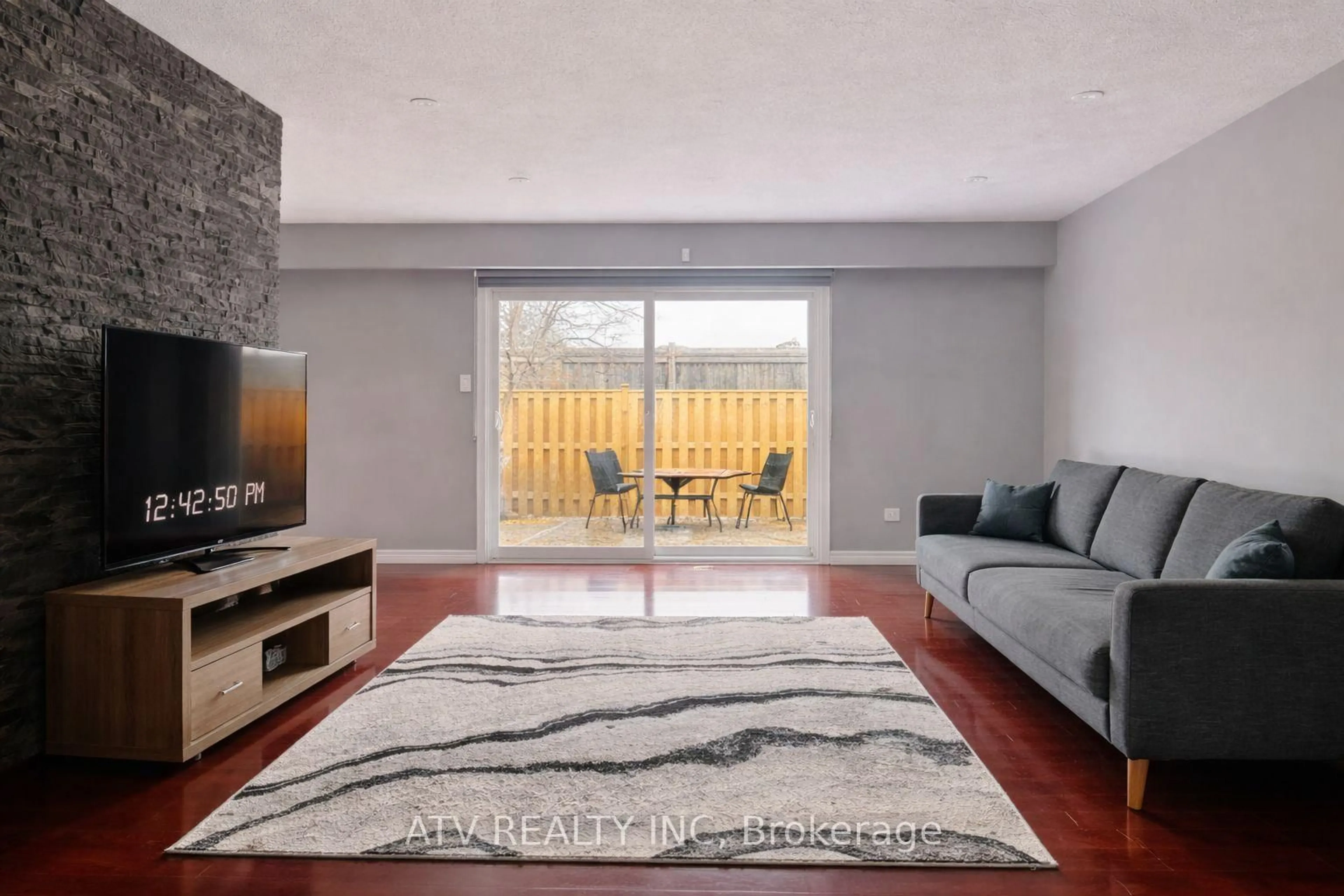 Living room with furniture, unknown for 1538 Lancaster Dr #119, Oakville Ontario L6H 2Z3