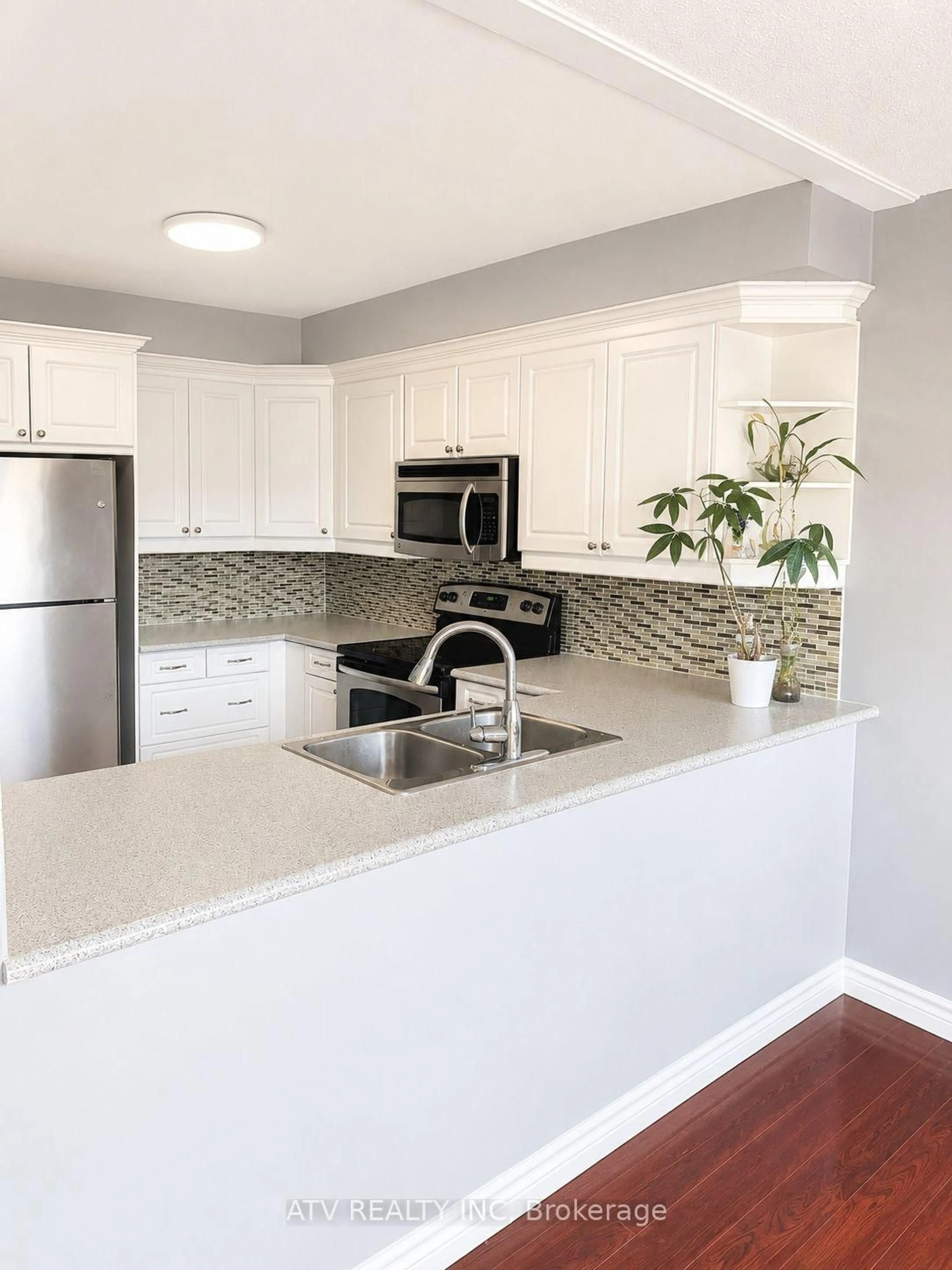 Open concept kitchen, unknown for 1538 Lancaster Dr #119, Oakville Ontario L6H 2Z3